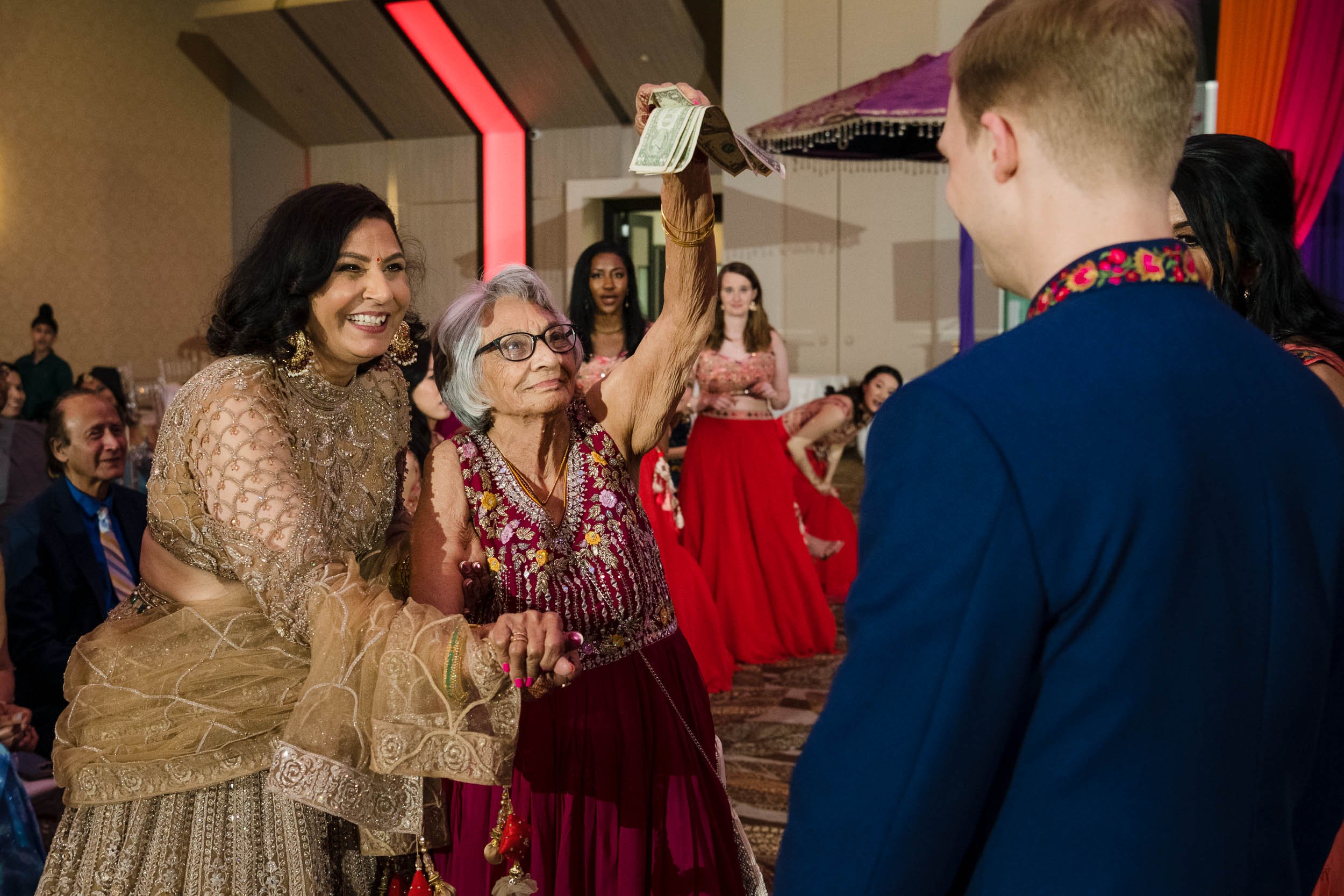 Indian Wedding Photographers Chicago | Renaissance Schaumburg | J. Brown Photography | grandmother blesses couple during sangeet.