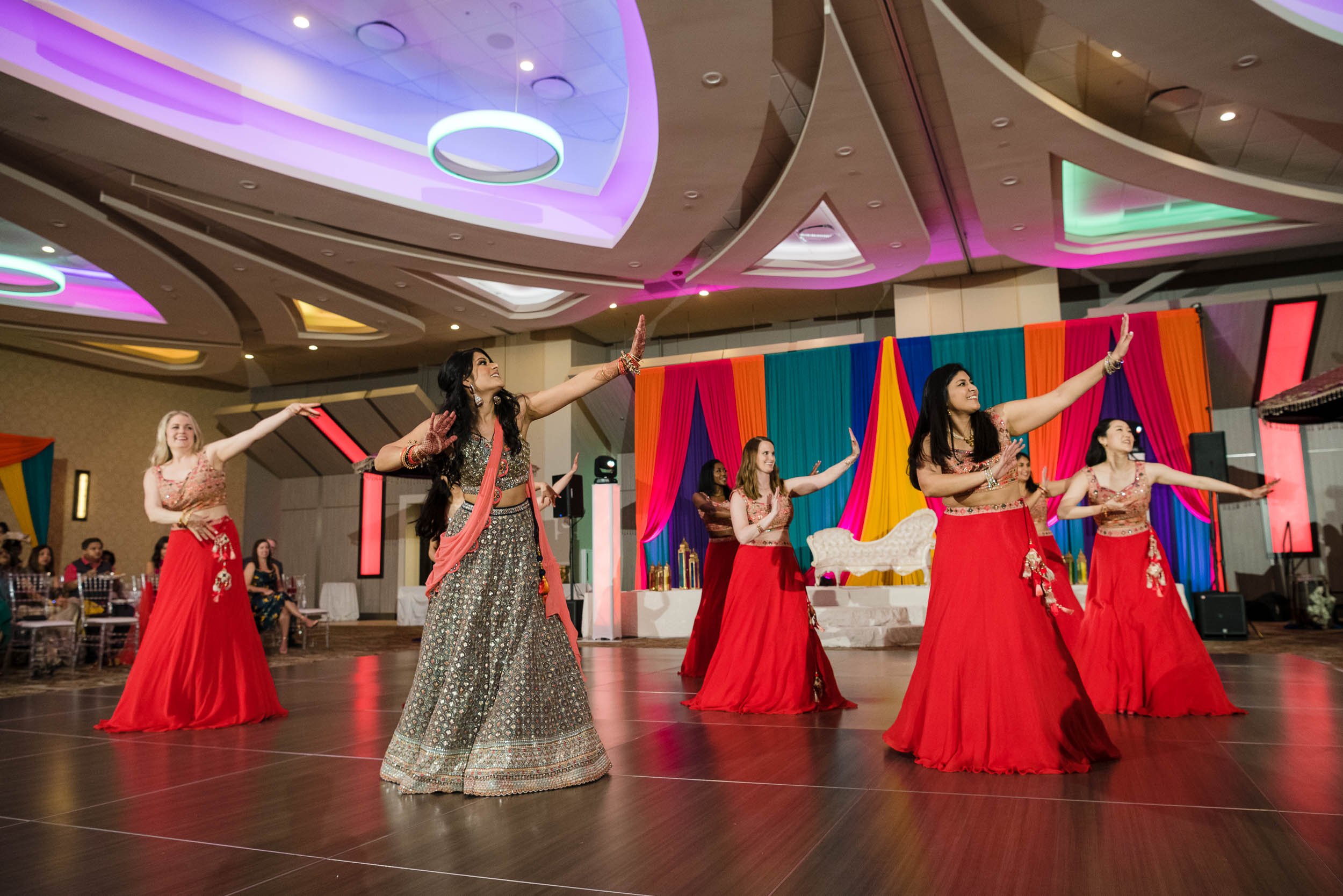 Indian Wedding Photographers Chicago | Renaissance Schaumburg | J. Brown Photography | bride and bridesmaids dance during sangeet.