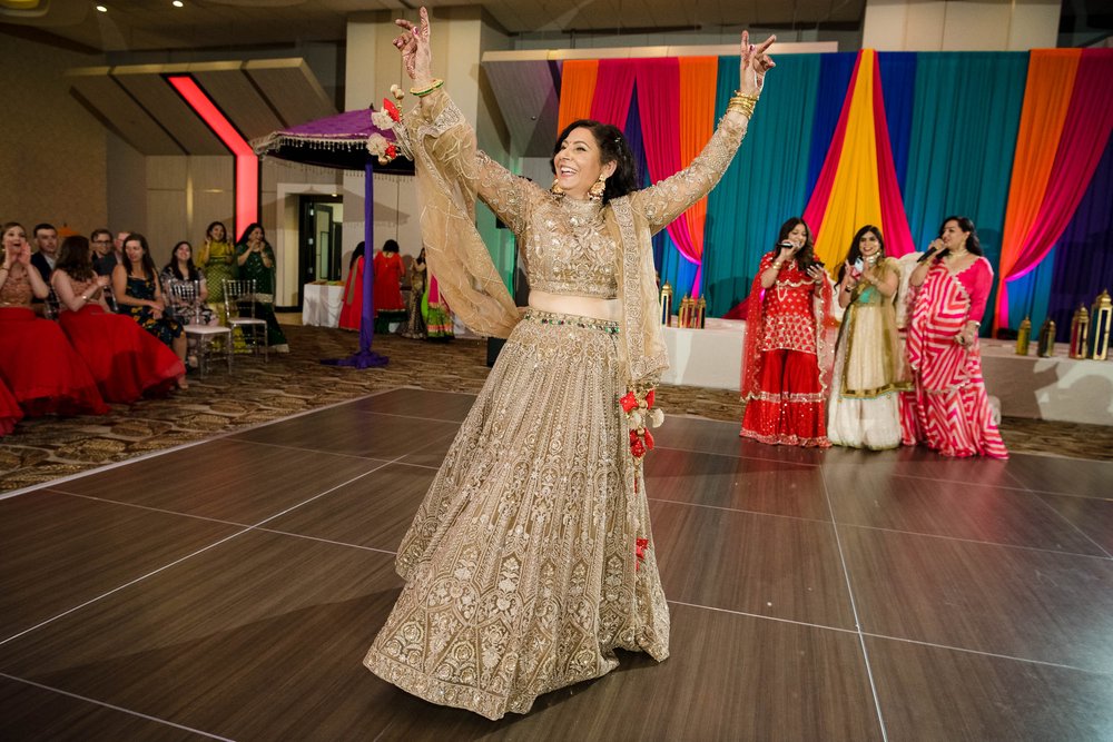 Indian Wedding Photographers Chicago | Renaissance Schaumburg | J. Brown Photography | mother of the bride on the dance floor.