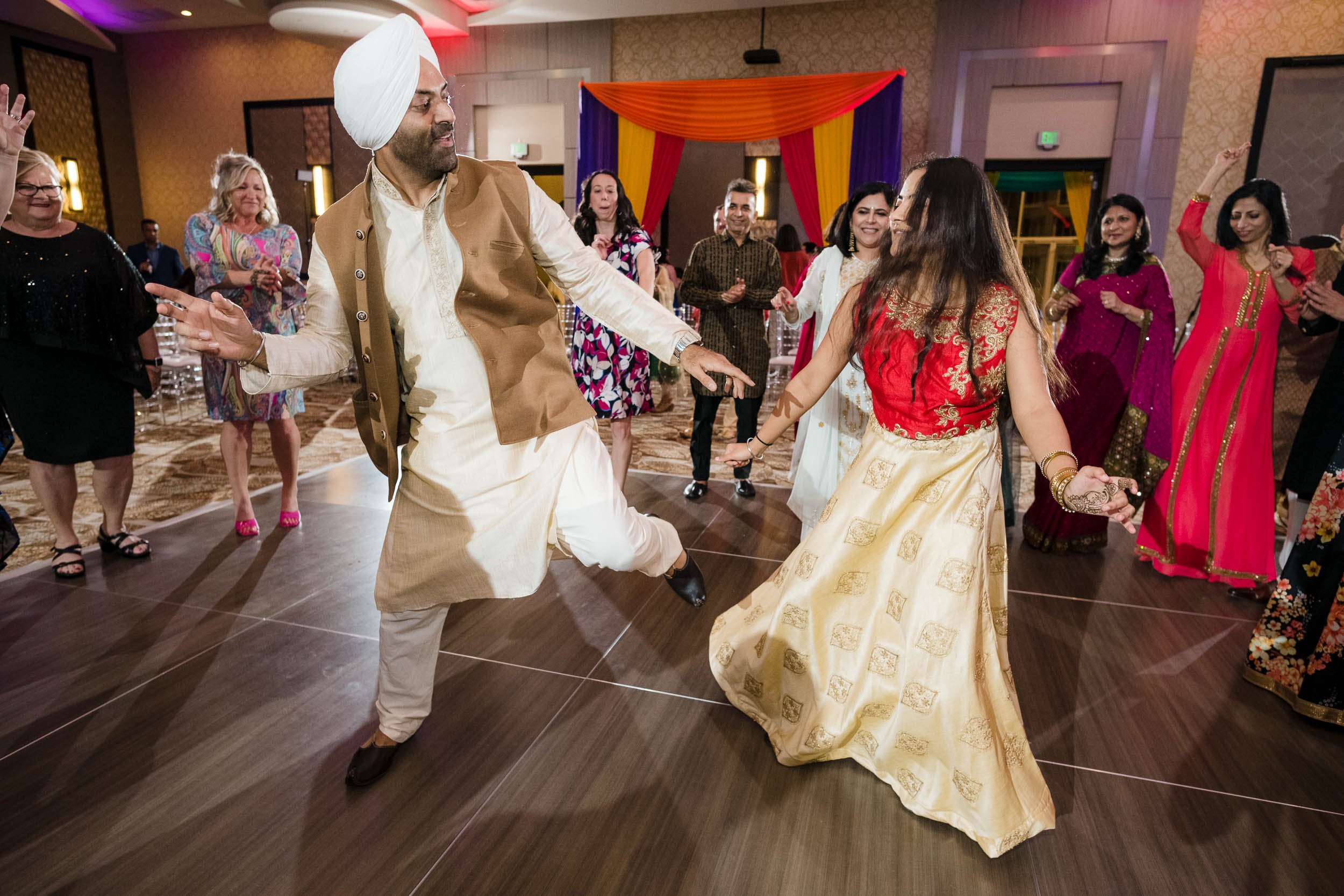 Indian Wedding Photographers Chicago | Renaissance Schaumburg | J. Brown Photography | Sangeet dance floor moment.