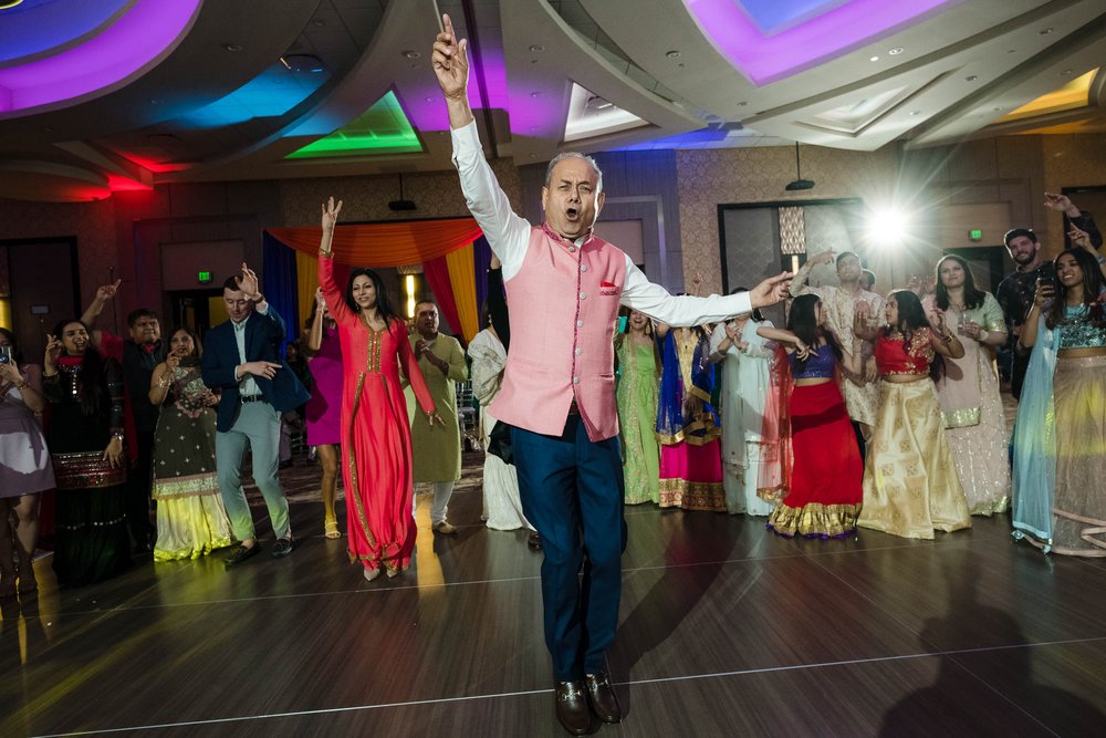 Indian Wedding Photographers Chicago | Renaissance Schaumburg | J. Brown Photography | funny dance floor action during sangeet.