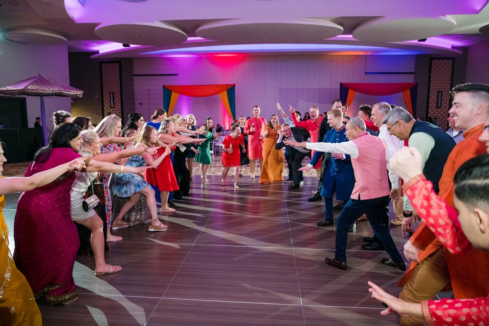 Indian Wedding Photographers Chicago | Renaissance Schaumburg | J. Brown Photography | dance floor moments during sangeet.