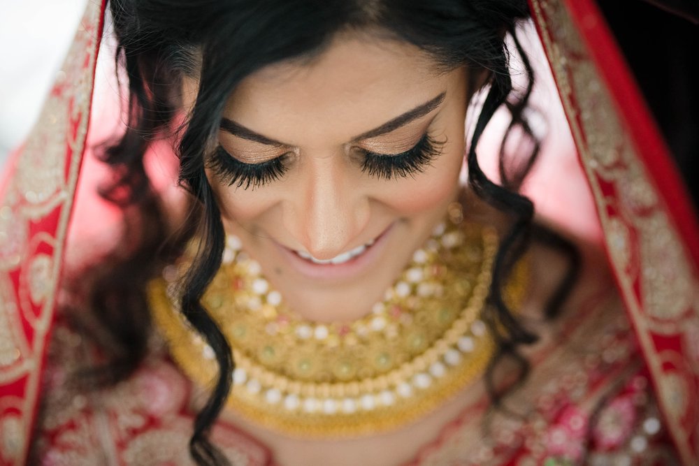 Indian Wedding Photographers | Renaissance Schaumburg | J. Brown Photography | bride getting ready on wedding day.