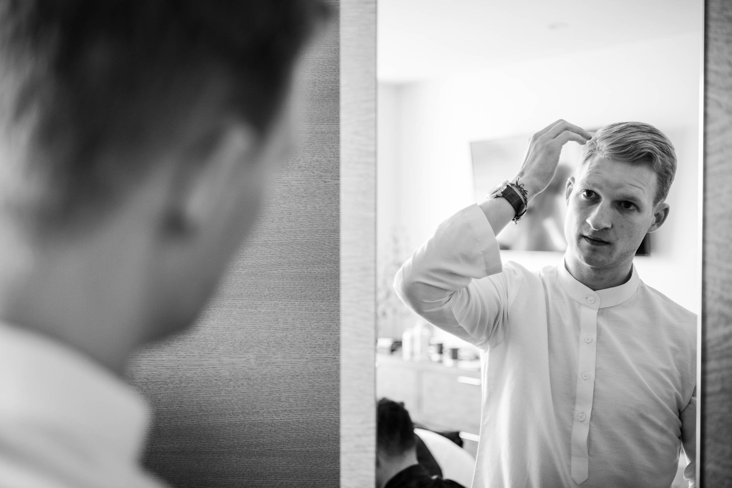 Chicago Wedding Photographer | Renaissance Schaumburg | J. Brown Photography | groom getting ready. 