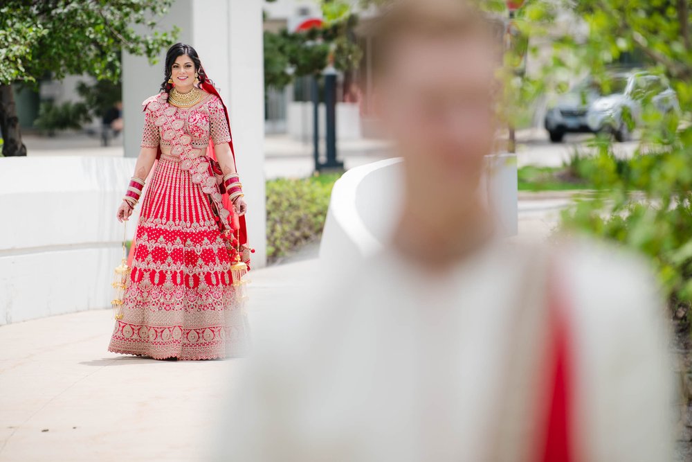 Indian Wedding Photographers Chicago | Renaissance Schaumburg | J. Brown Photography | bride approaches for first look.