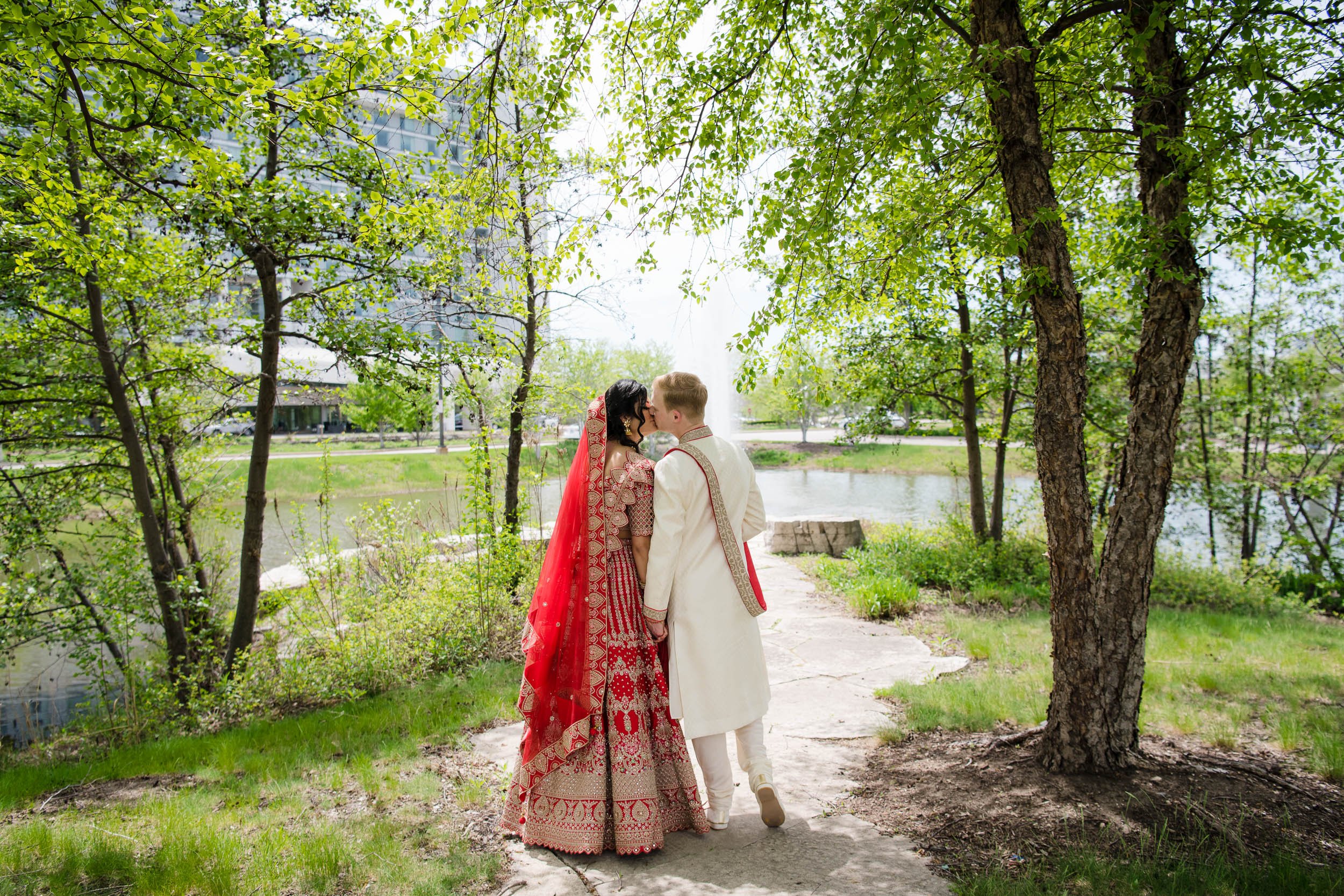 Indian Wedding Photographers Chicago | Renaissance Schaumburg | J. Brown Photography | bride and groom portrait of kiss. 