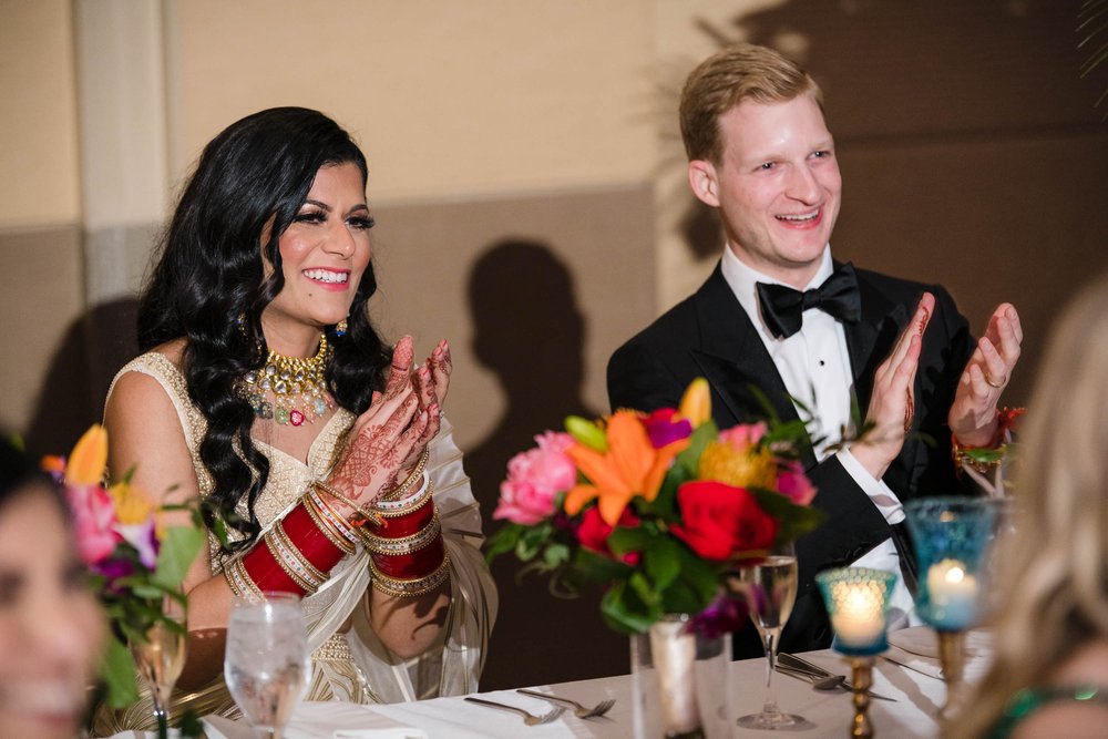 Chicago Wedding Photographer | Renaissance Schaumburg | J. Brown Photography | couple laughs during speeches.