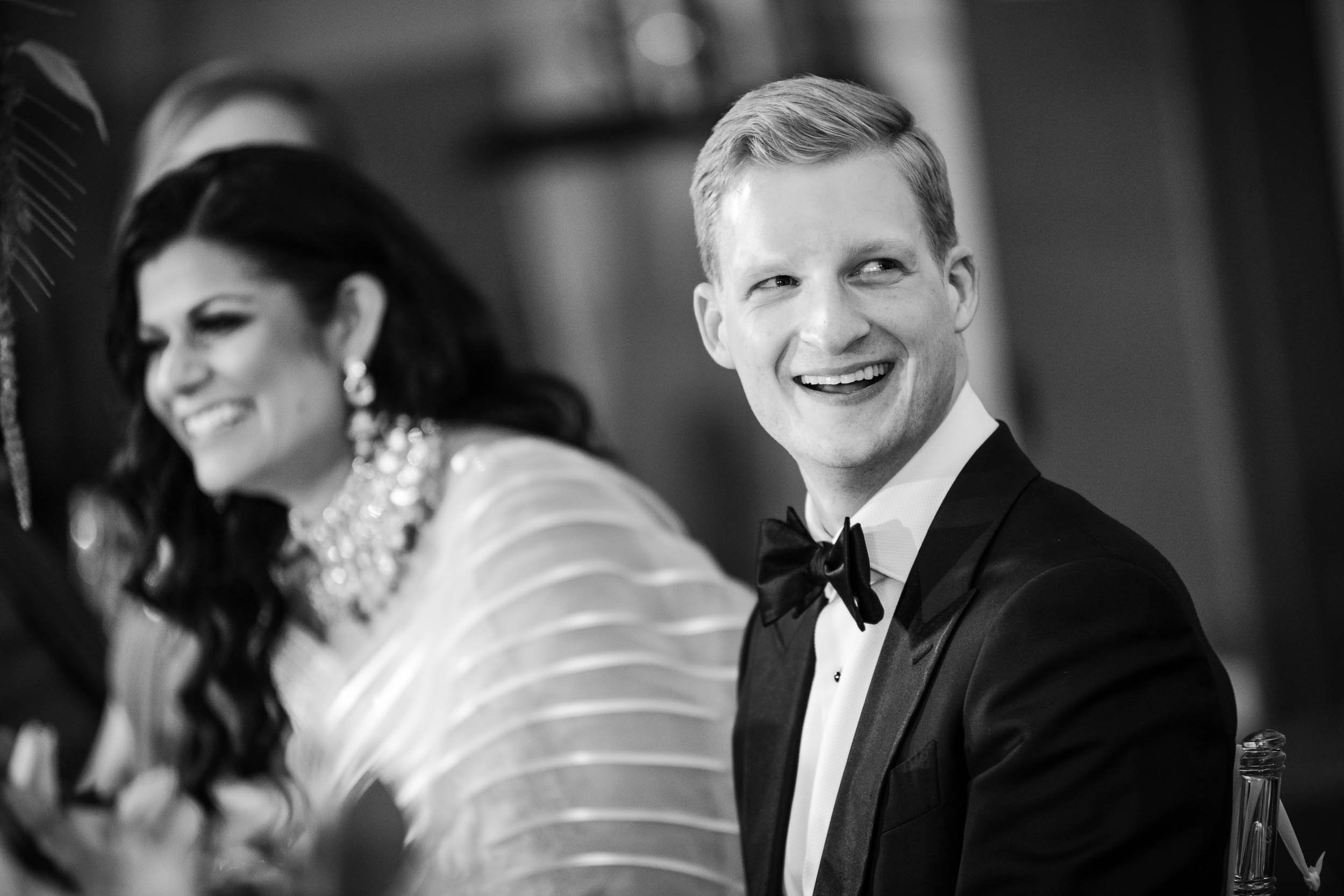 Chicago Wedding Photographer | Renaissance Schaumburg | J. Brown Photography | groom laughs during best man toasts.