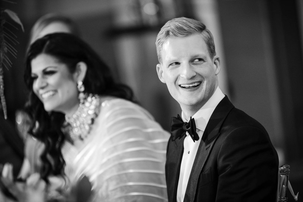 Chicago Wedding Photographer | Renaissance Schaumburg | J. Brown Photography | groom laughs during best man toasts.