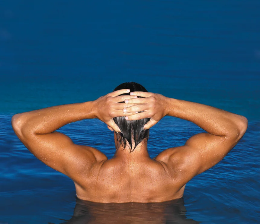 stock-photo-portrait-of-masculinity-portrait-of-young-shirtless-african-man-looking-at-camera-while-standing-184562012.jpg
