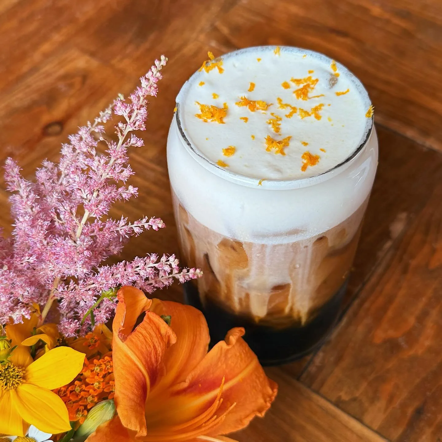 Sparkling orange vanilla cold brew! Come by and try this unique summer special🍊✨