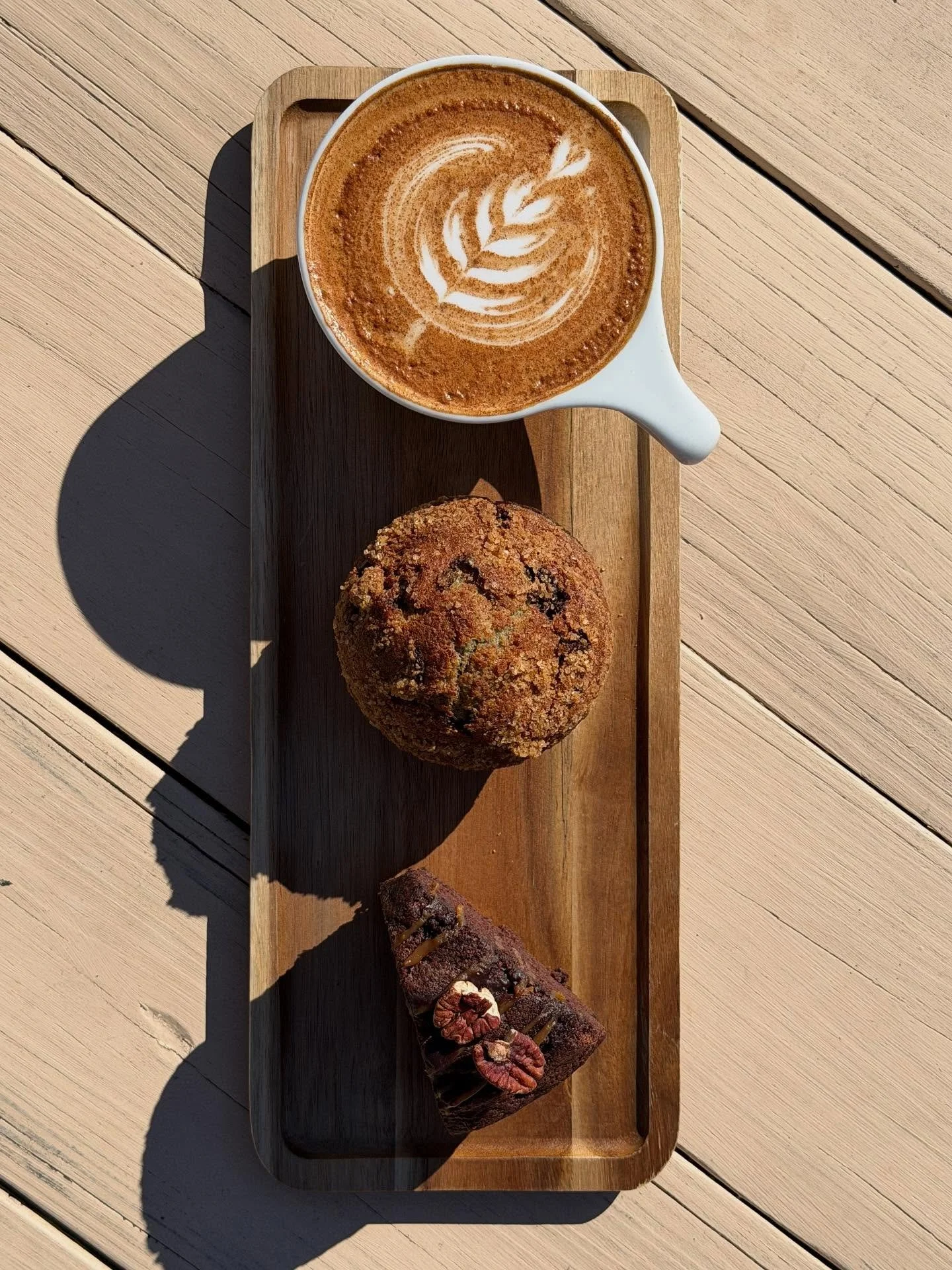 Orange cardamom chocolate chunk muffin + our chocolate turtle Bundt cake. Fresh new arrivals from our bakery! ☕✨