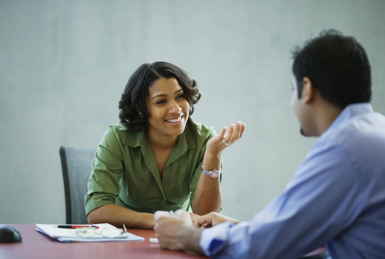 WOMAN-TALKING-OFFICE.jpg