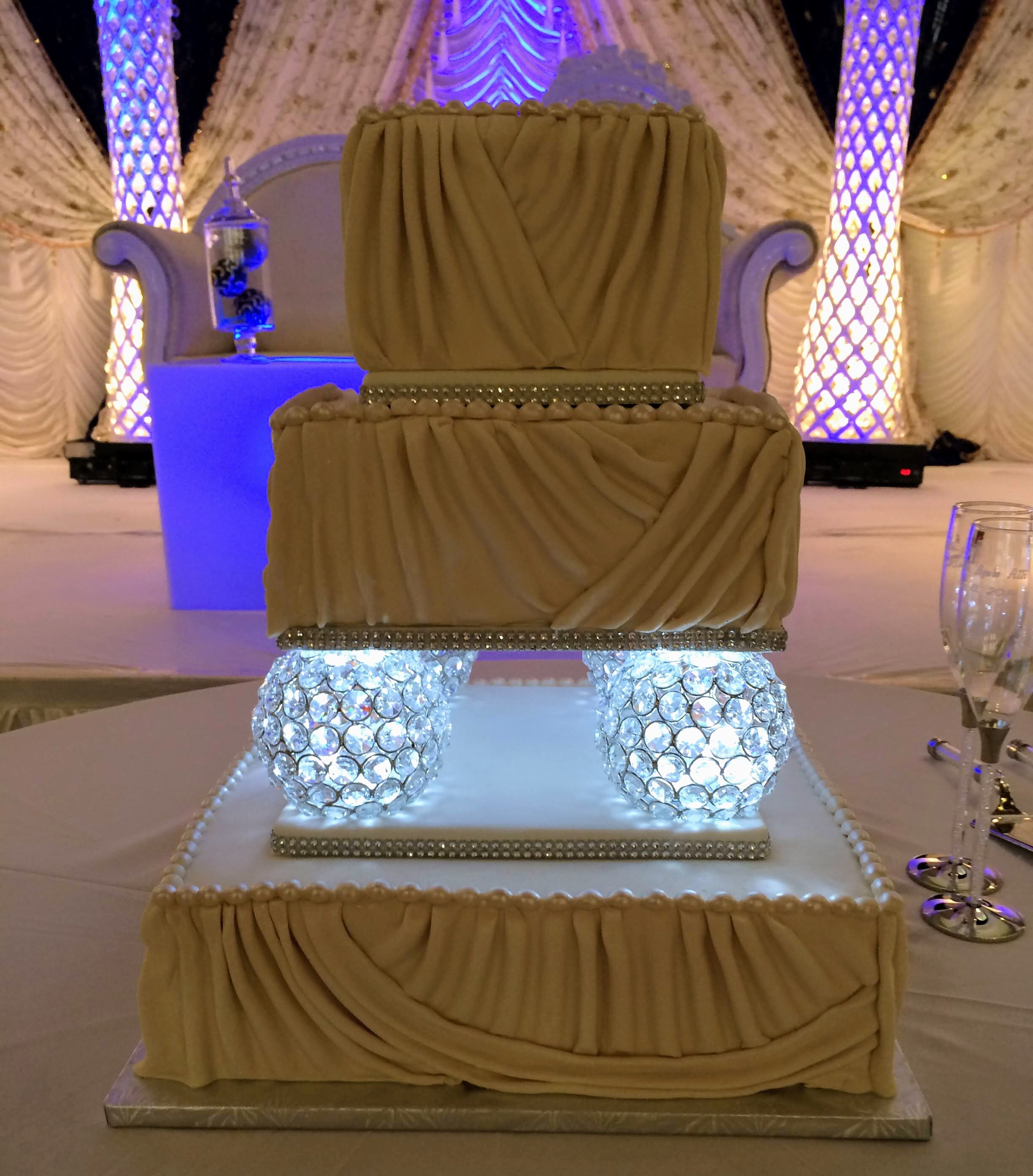 Drape Lit Wedding Cake.jpg