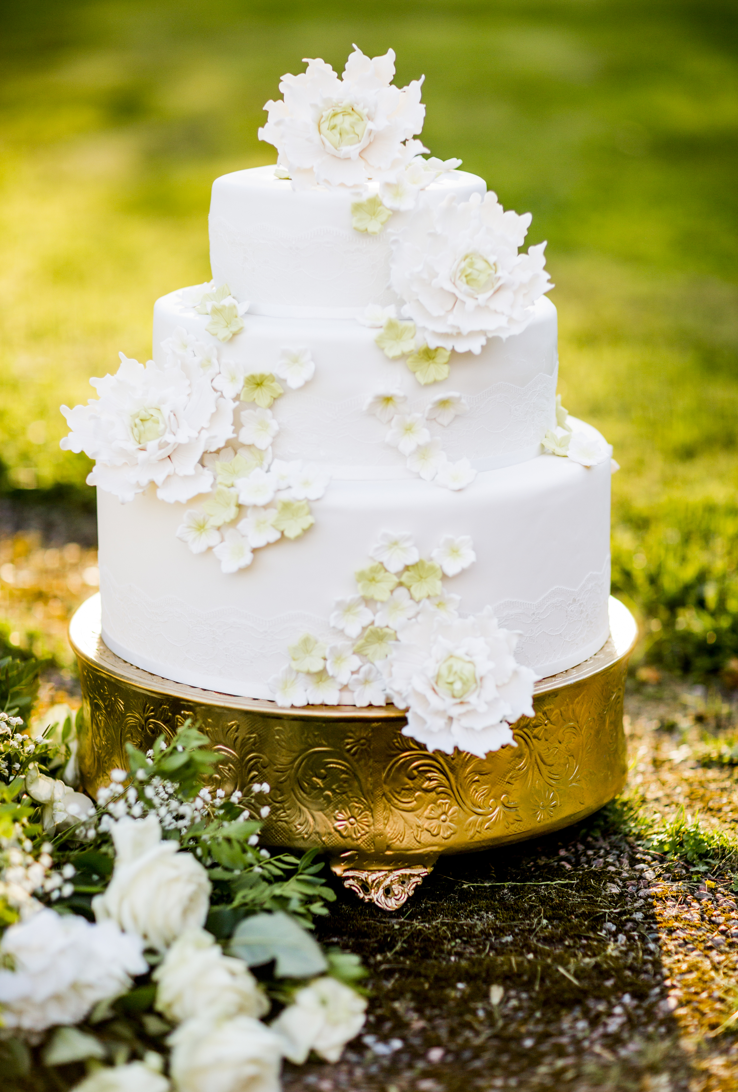 Bröllopstårta guld vit Wedding photographer