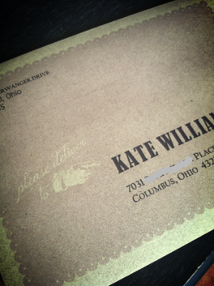 Front of the envelope, Addressed with a little scalloped and hand graphic.