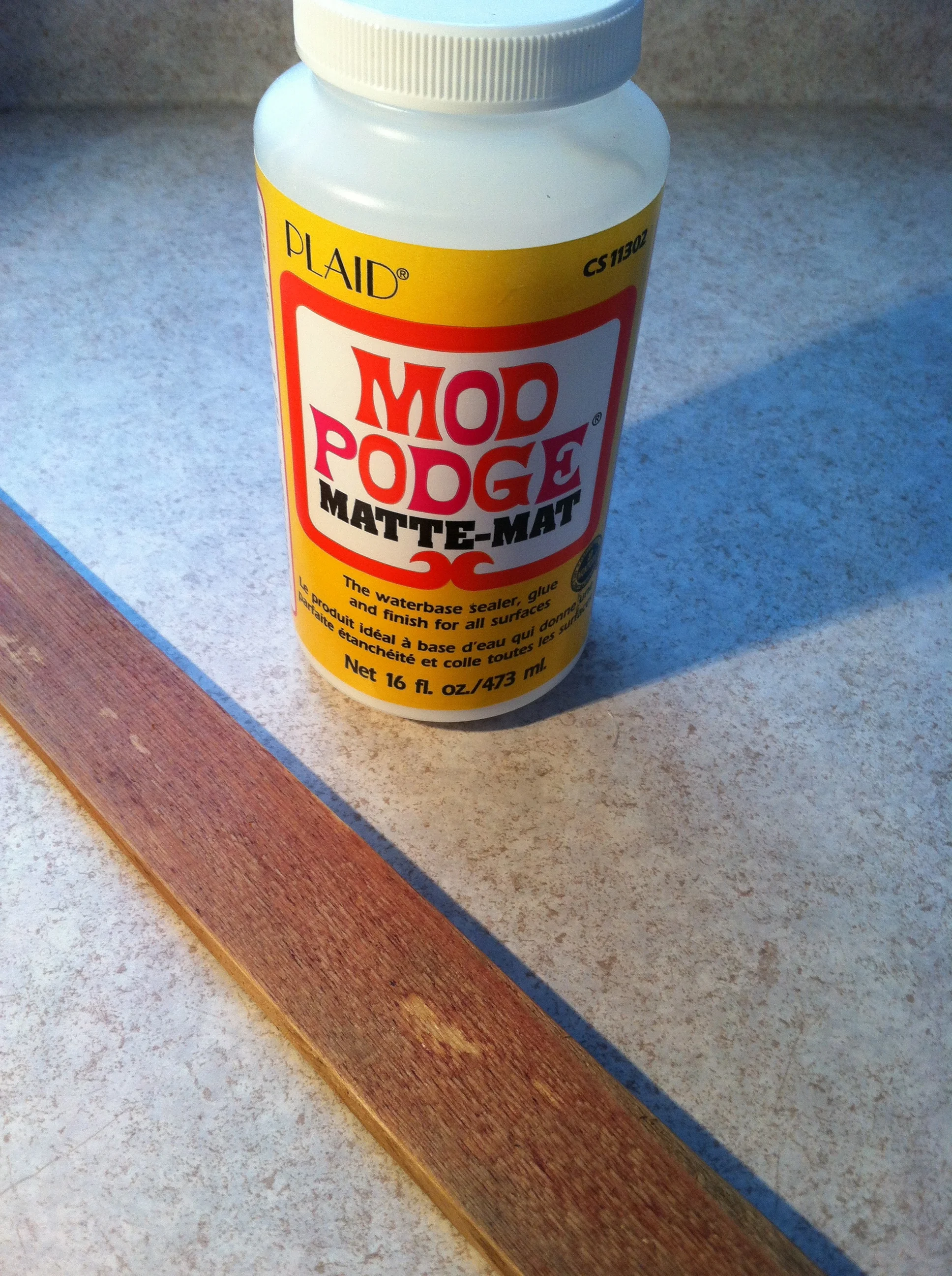 Not willing to commit to a large piece of wood I selected a piece of wood shim. If it looks cool maybe I'll do a bigger and better one. 