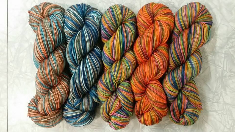 A few of our OOAK variegated skeins.
