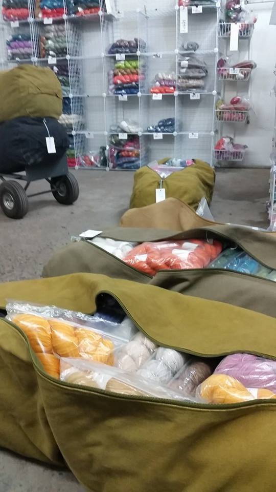 This is the "before" photo - packing yarn at the warehouse - check our Facebook for the "after" - set up in Santa Clara!