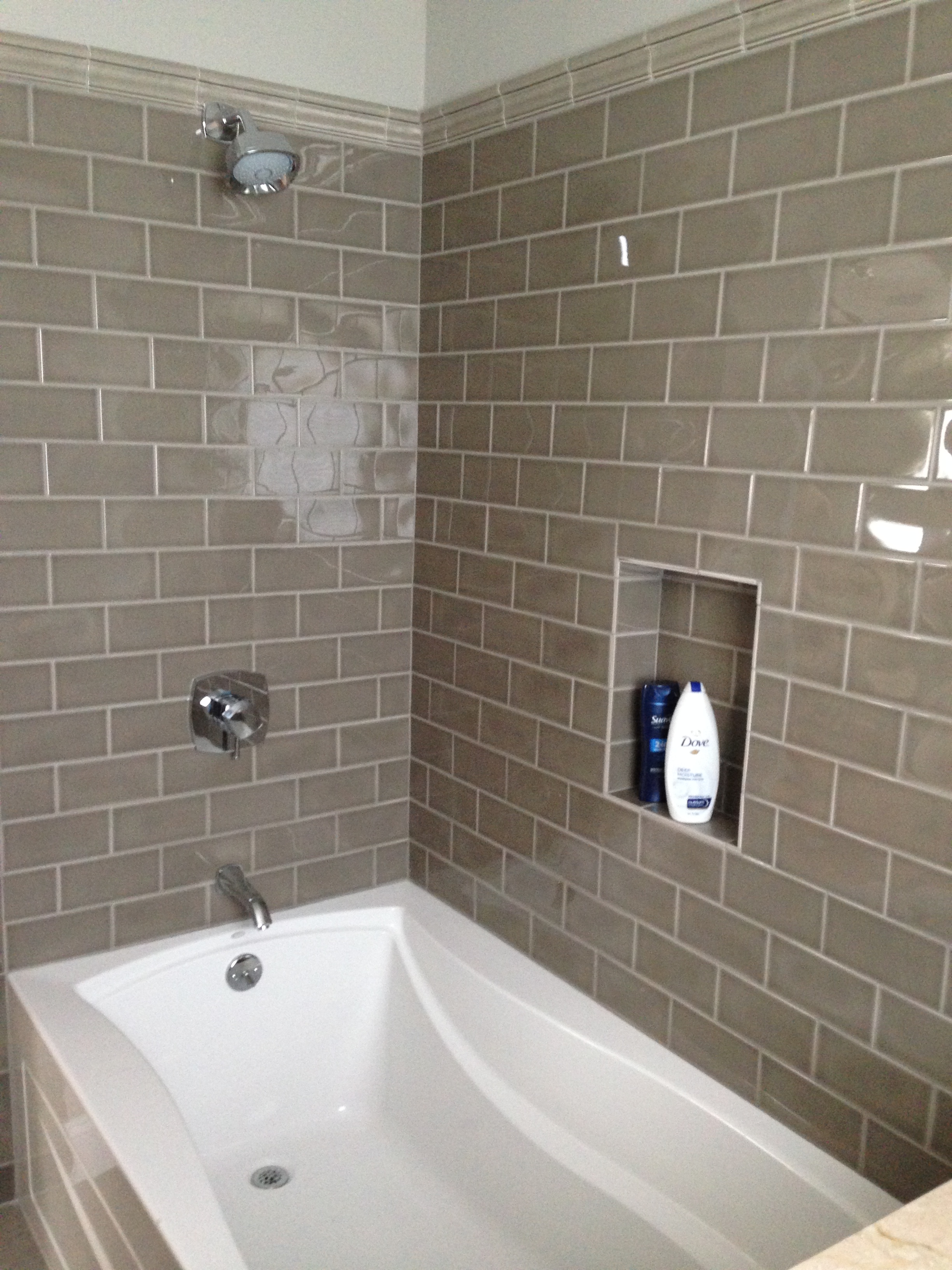 Tub/shower in gorgeous taupe with crown detail.