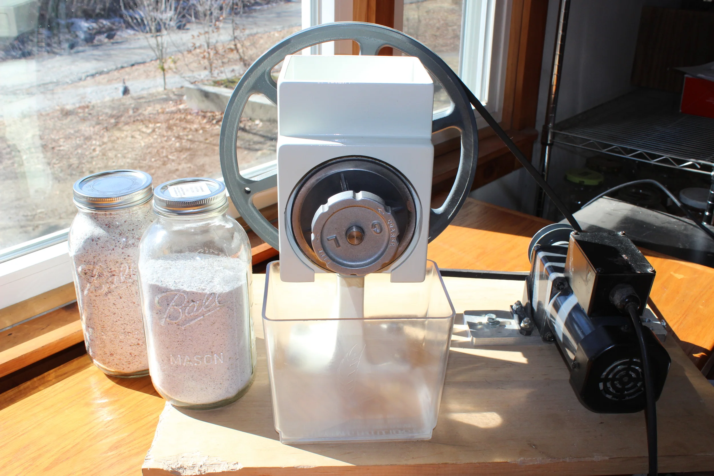 The Country Living Grain Mill (with jars of Painted Mtn and Hopi Blue cornmeal)
