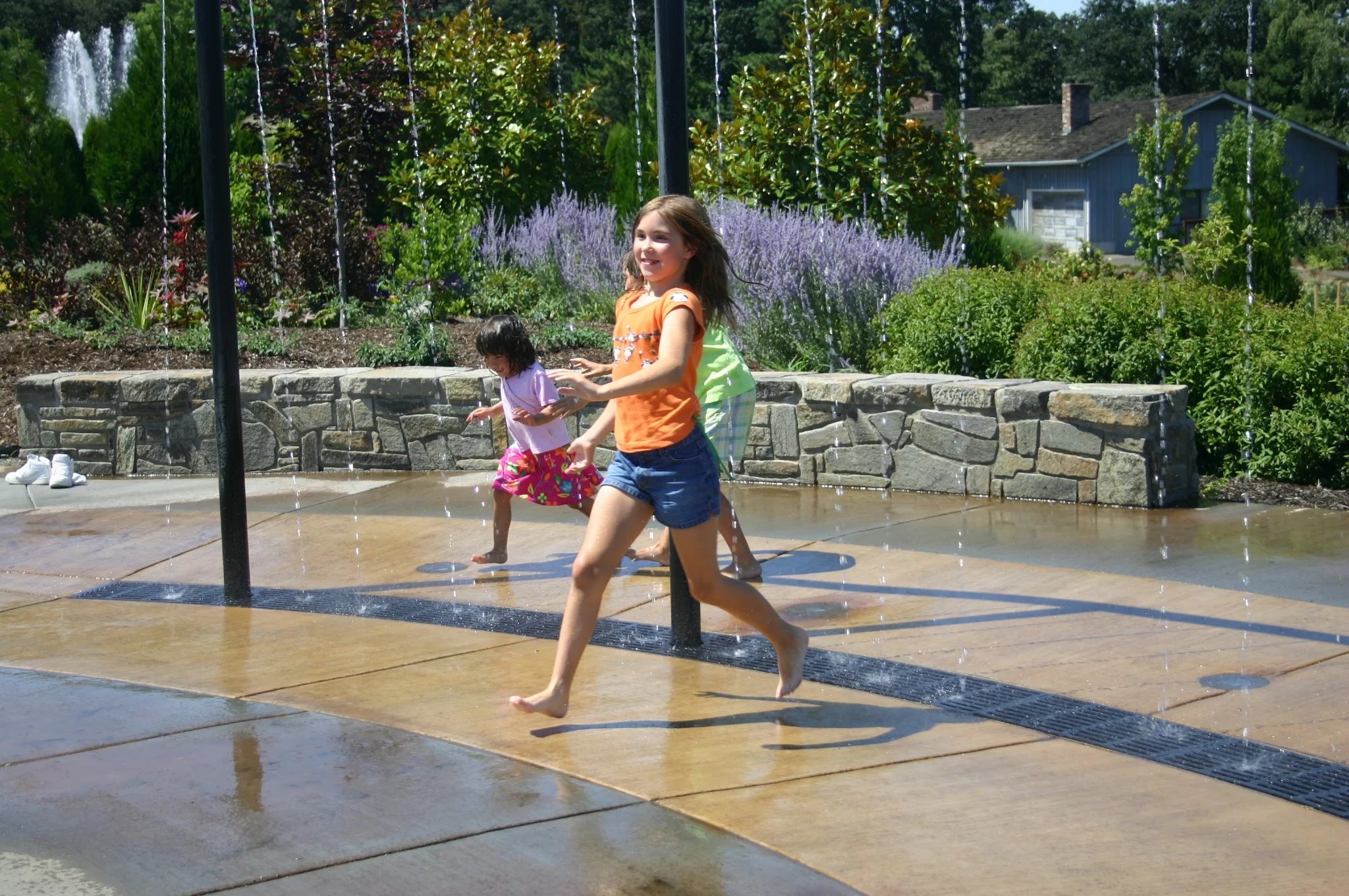 Sensory Garden_girls in rain curtain.jpg