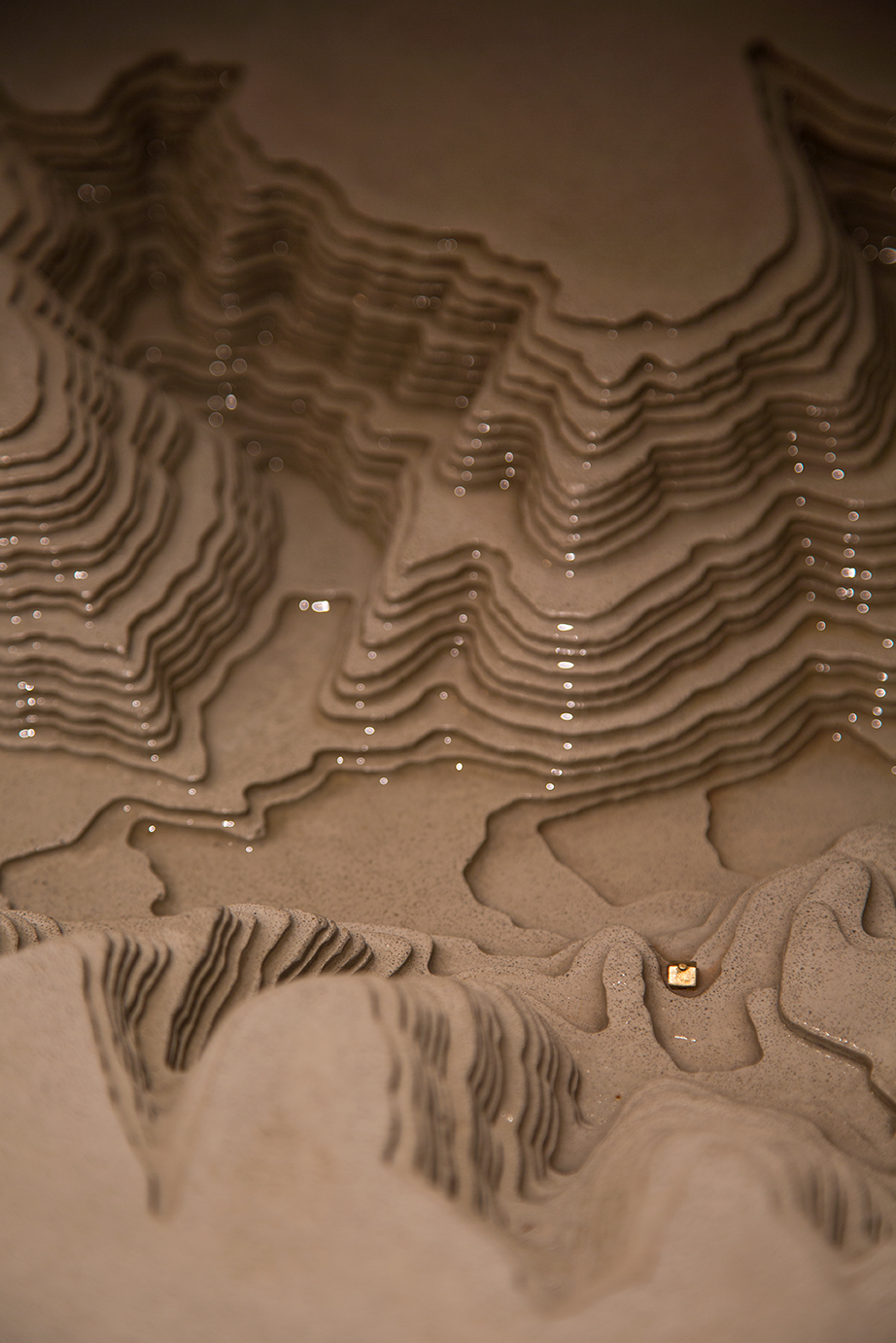 Monoply house in brass marks the spot