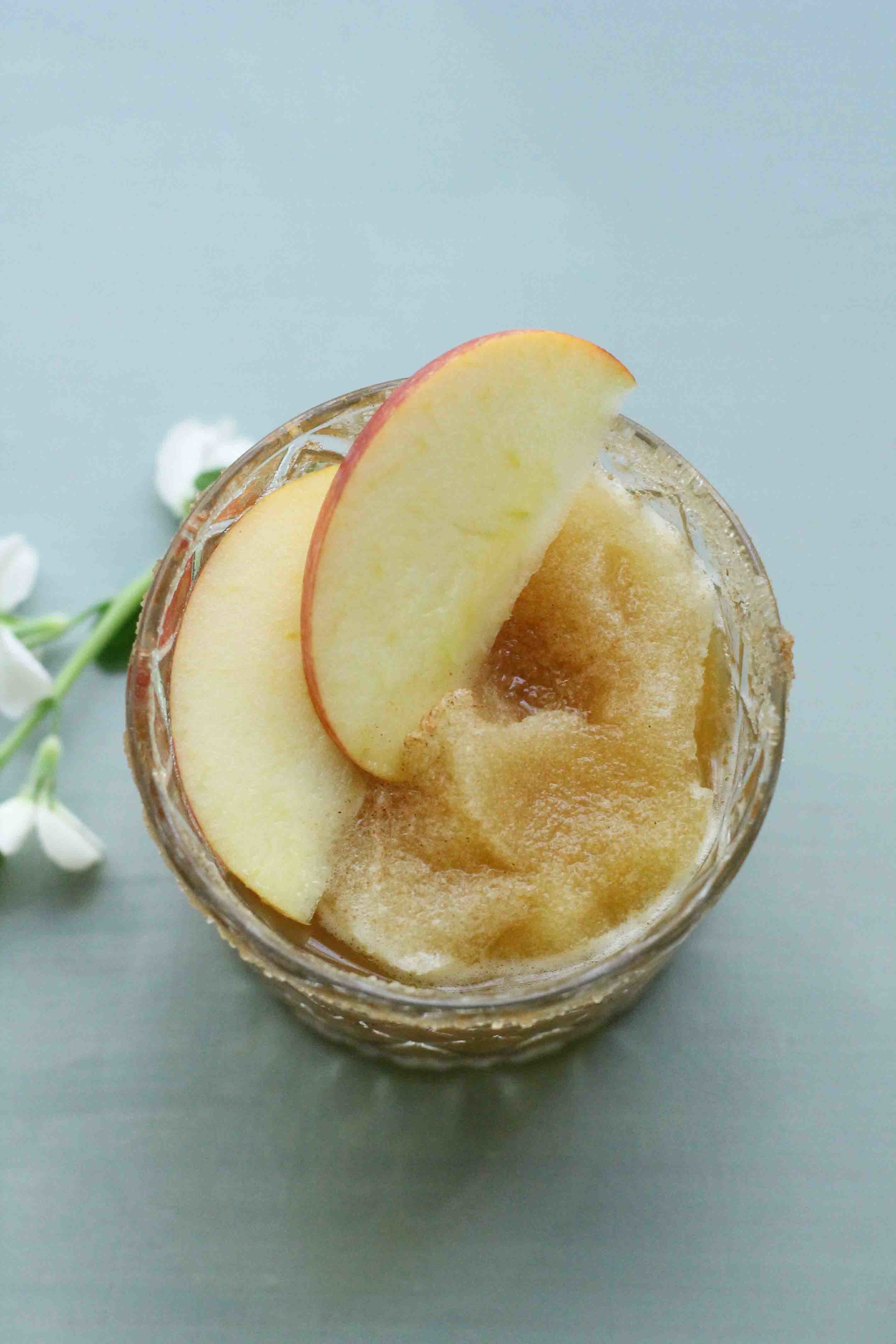 These apple cider slushies are rimmed with spiced sugar, making them the perfect, autumn mocktail! {Pedantic Foodie}