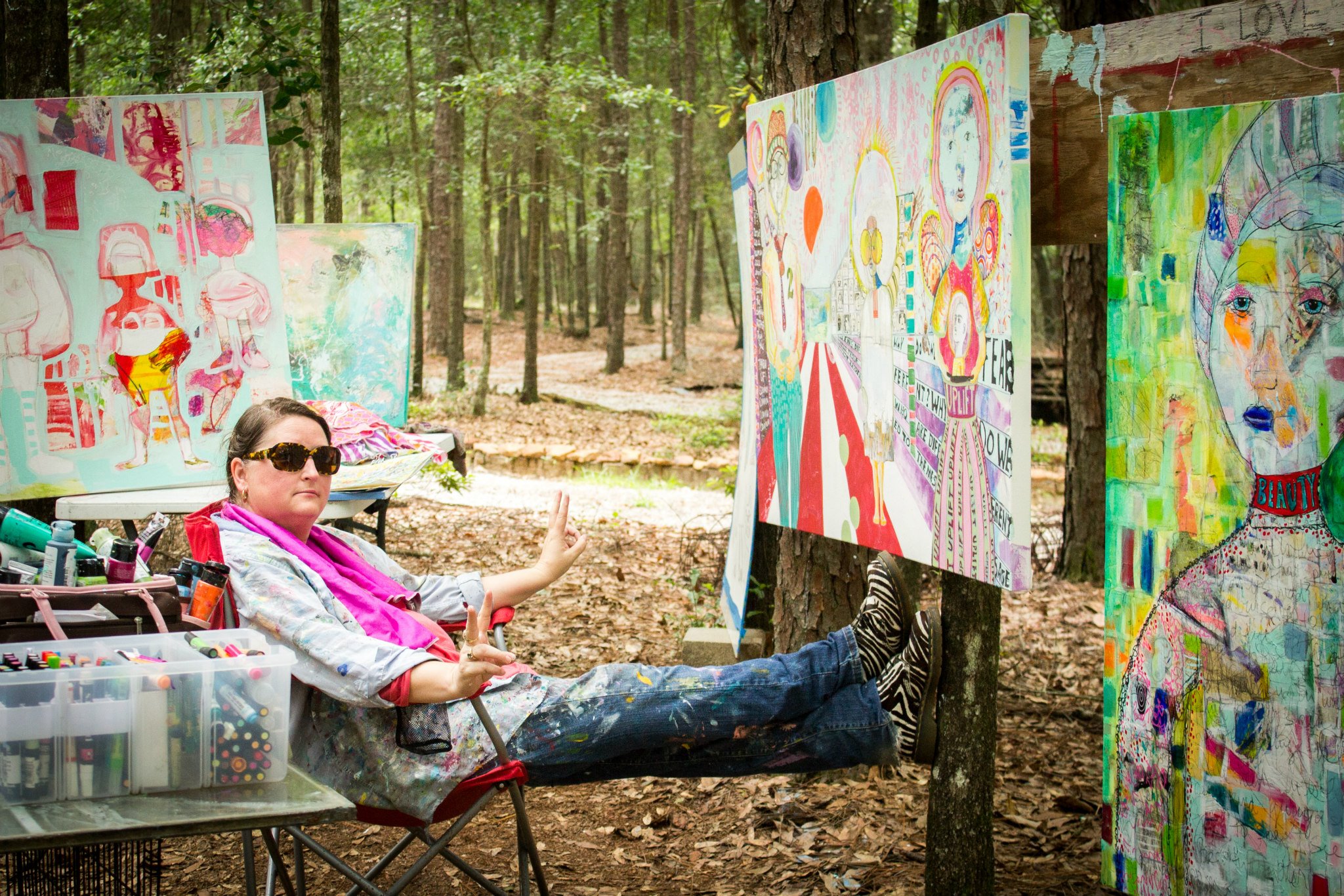 Having fun is a MUST in my world and here is a pic of me in my outdoor studio goofing off, loving a full paint day, and sending my most important message....peace. :)