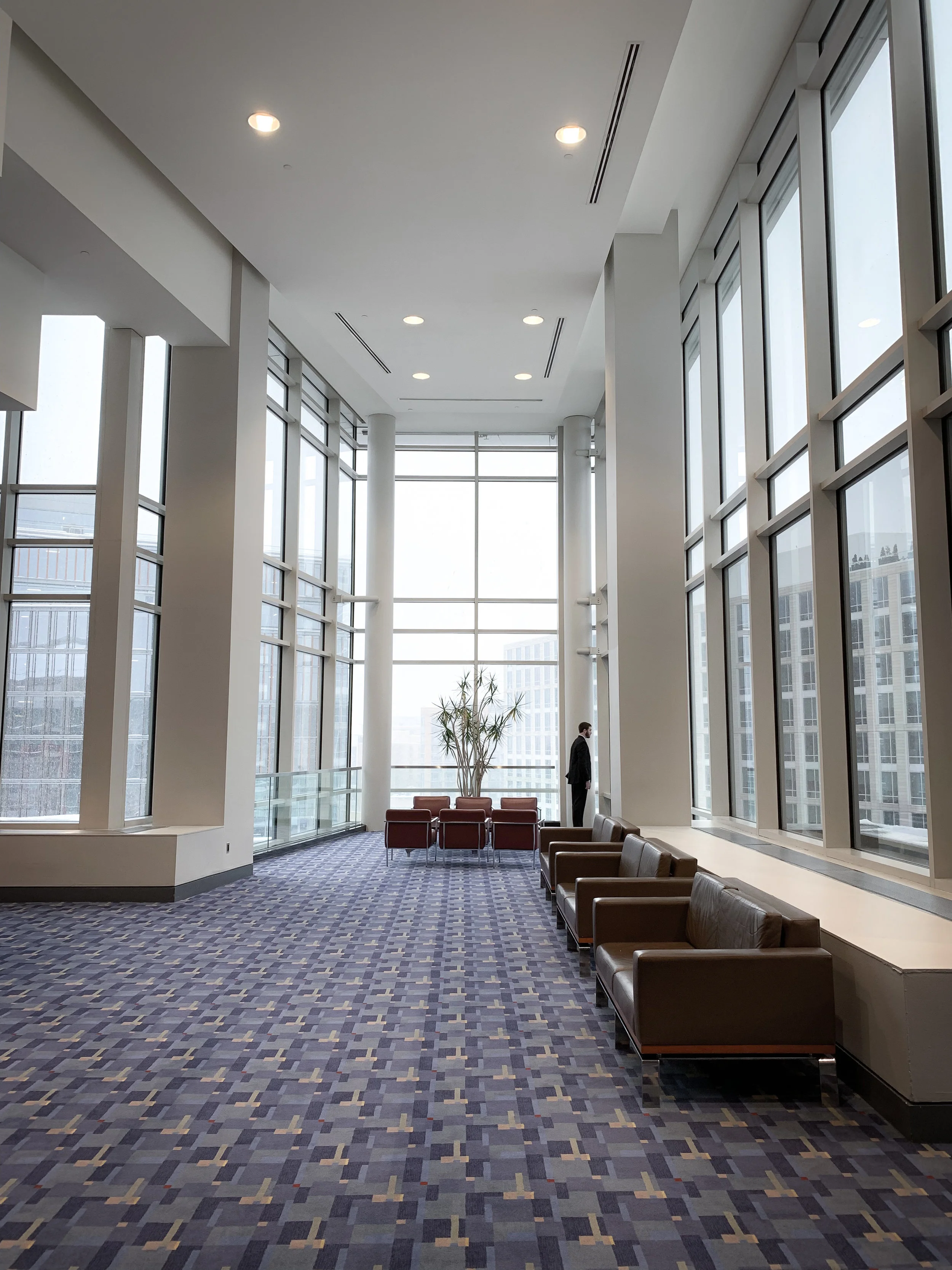 Using the architectural features of this building interior provides a perfect way to direct the viewer to the subject in this composition.