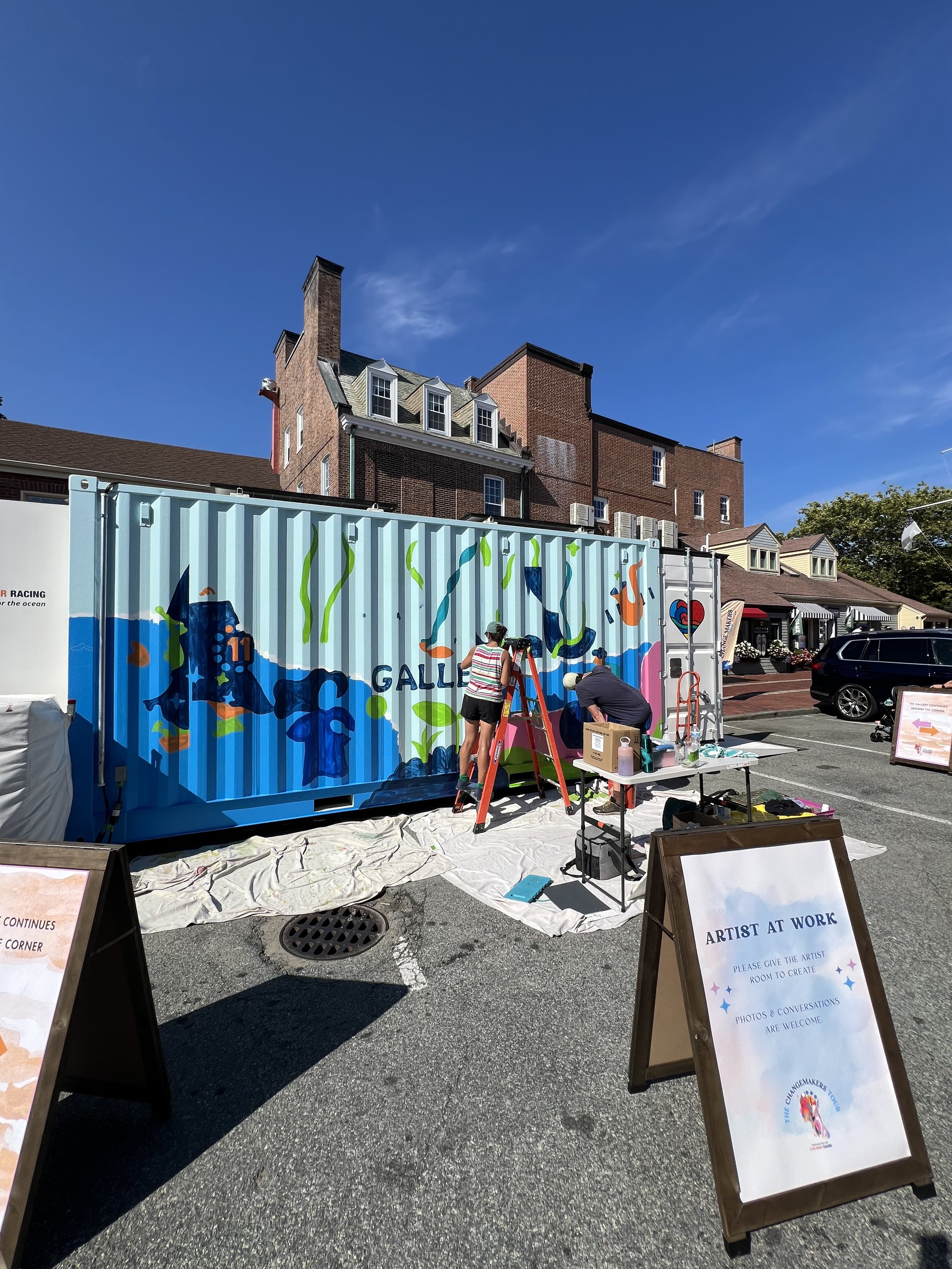 Live painting the large scale mural on the metal shipping container on Bowen's Wharf in Newport RI for 11th Hour Racing's Change maker's tour