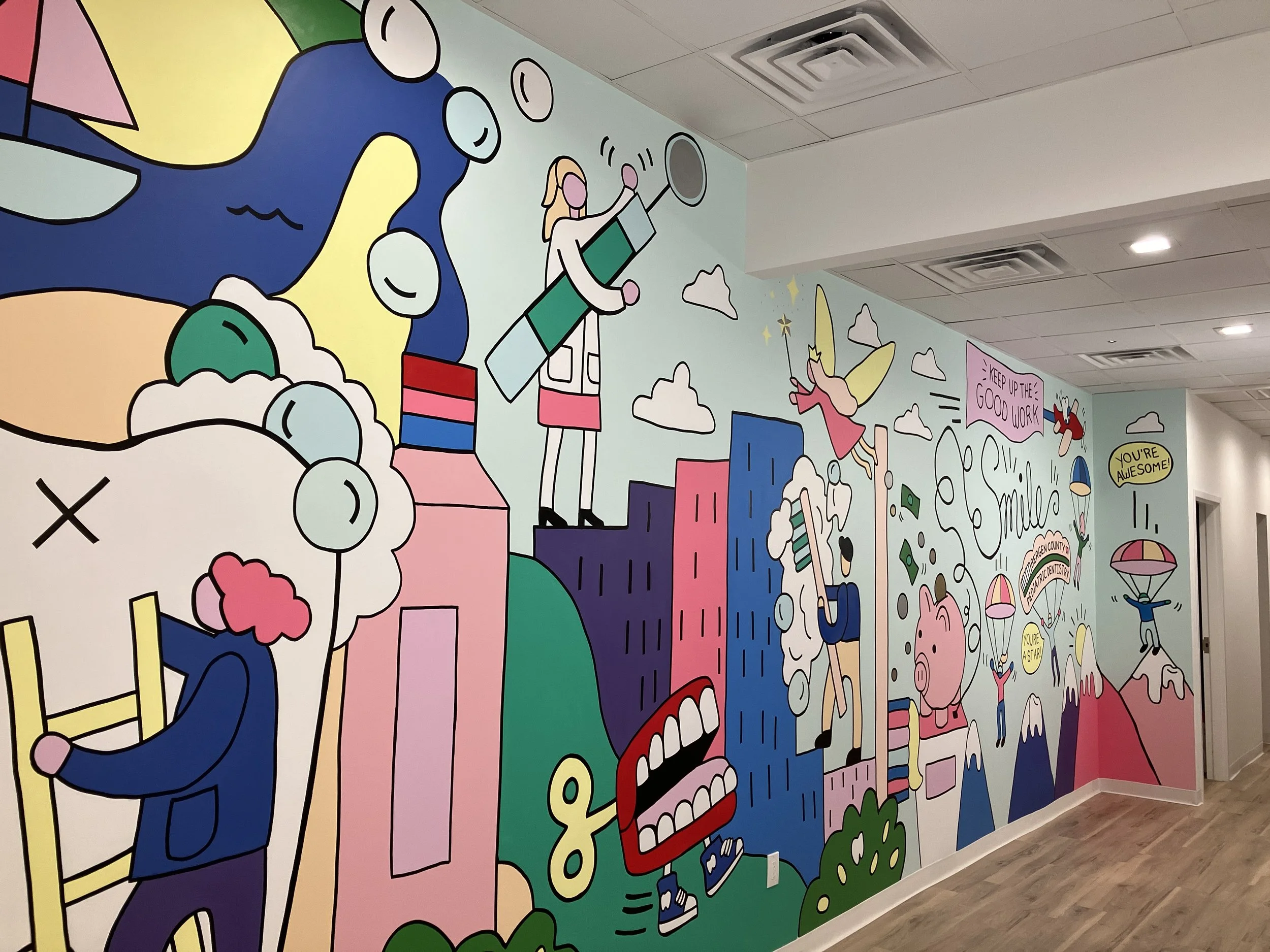 Finished hand-painted large-scale mural in a commercial space.