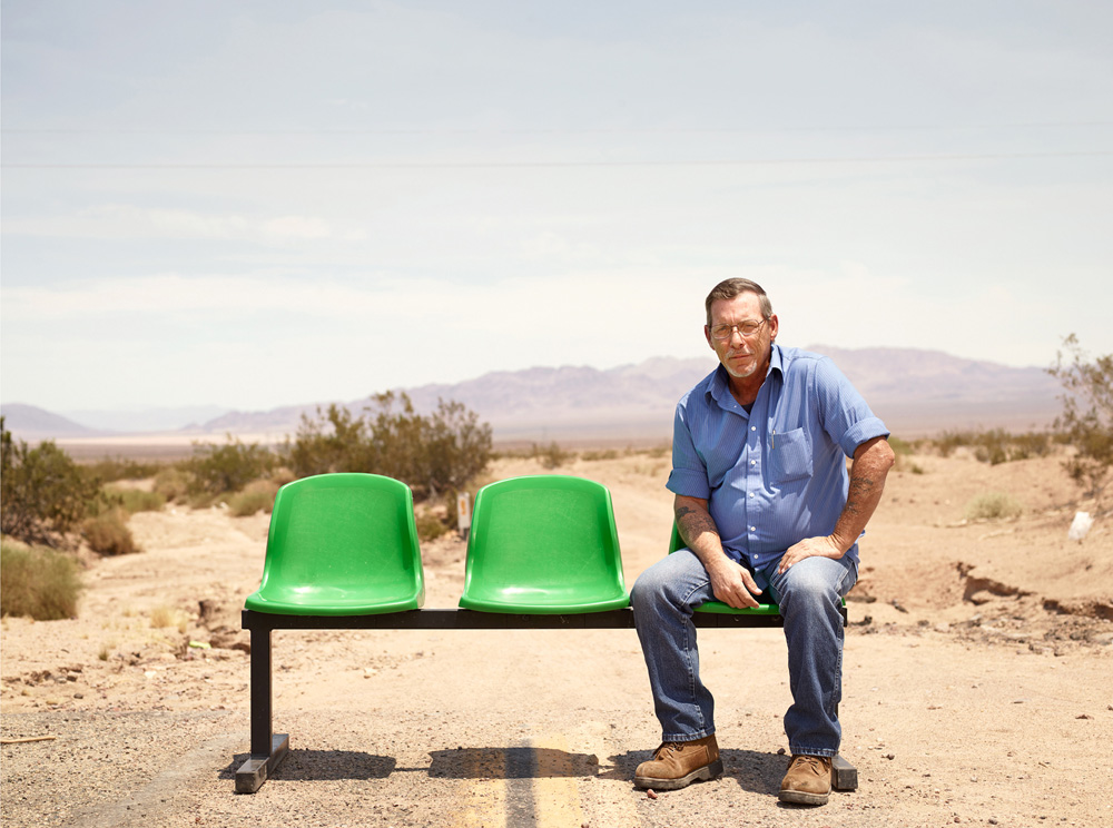   Dan Blacksmith, age unknown, Ludlow CA, from the series 'Ages of US' by Dylan Collard. "Dan was a truck driver who wandered past our bench, chatted to Greg about his rig and then agreed to sit for me. He wasn’t interested in seeing or having any of