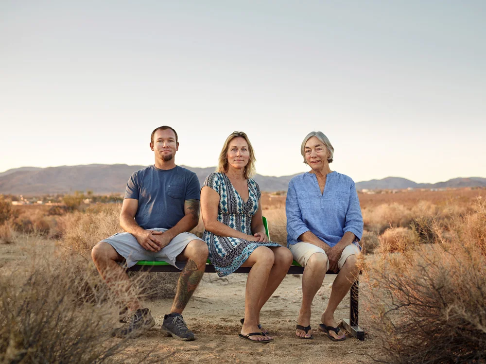 Heidi and Jane Grunt, 33, 53, 74, Joshua Tree, from the series 'Ages of US' by Dylan Collard. "This is 3 generations of the Grunt family who run and own the 29 Palms Inn at Joshua Tree National Park. When I was a student I won the Ilford Student Awards, the prize being a trip around California with a photographer. One of the places we stayed at on that trip was the 29 Palms Inn and its a place I loved and always wanted to return to. So I made their hotel one of the focal points of my trip and arranged with them that I’d photograph each generation of their family as part of the project." 