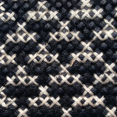 Cross-stitch on leather sample developed by Taller Nu in Mexico City