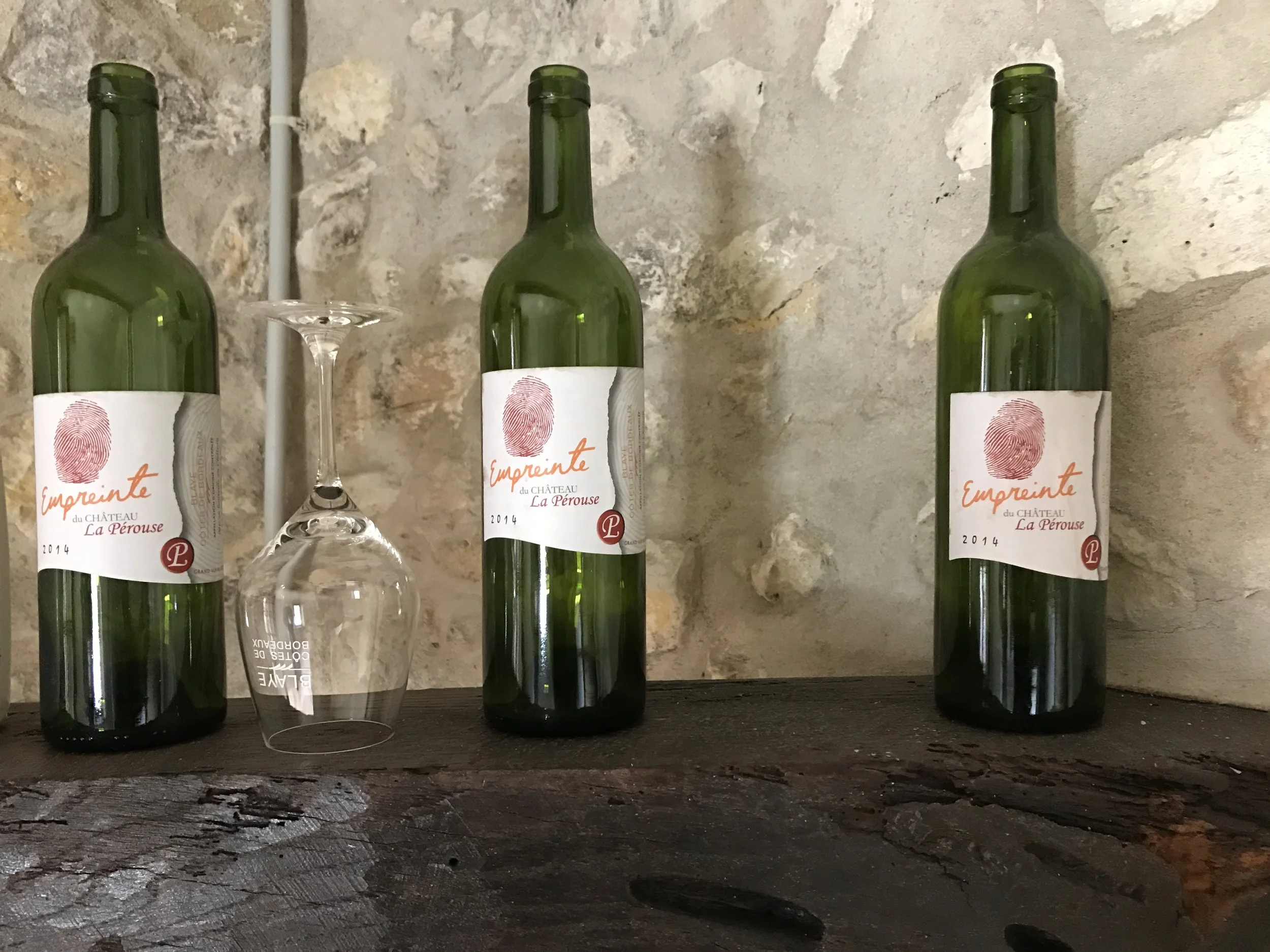 A few empty bottles from Chateau La Perouse 