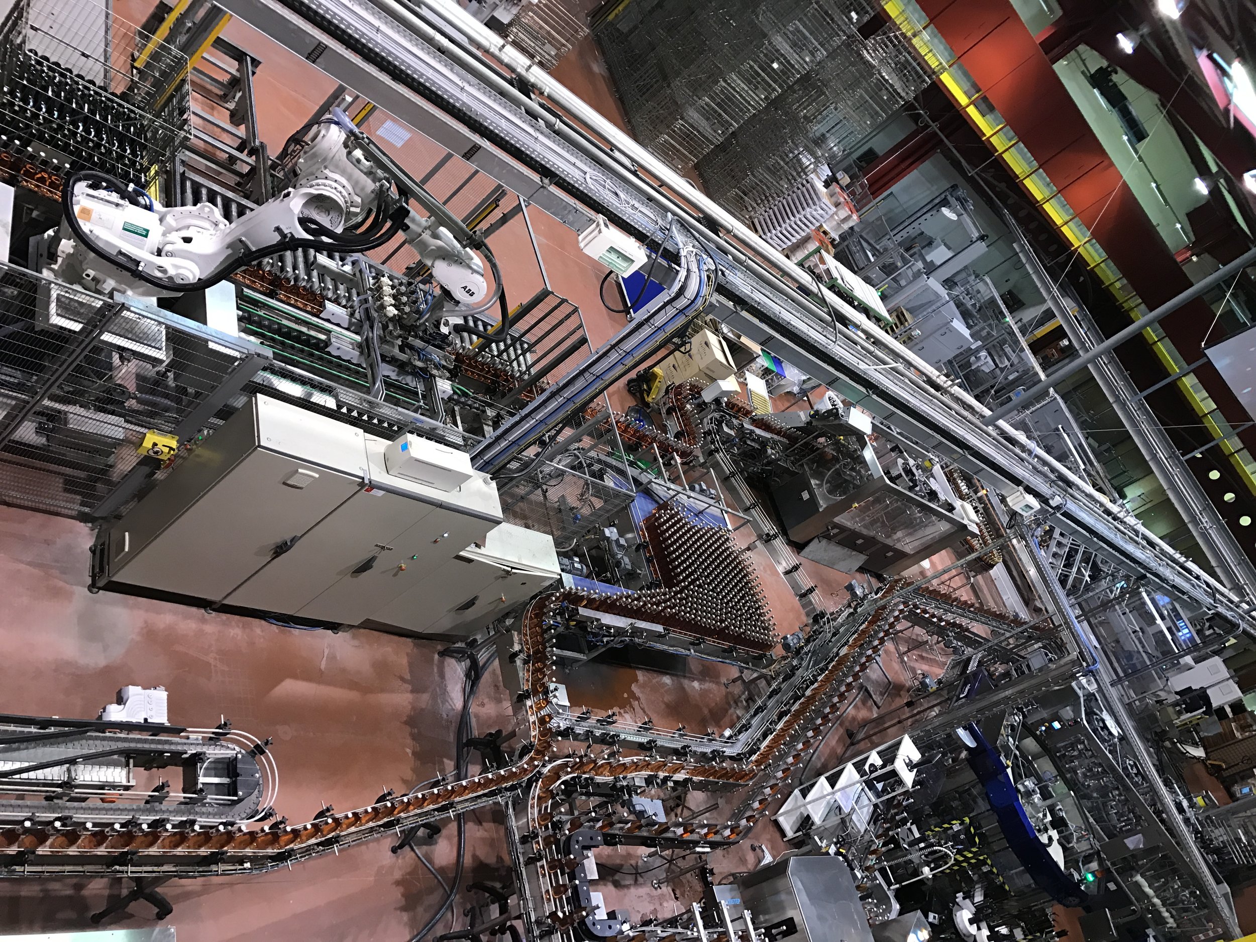 Disgorging, corking, labeling, and packaging line at Veuve Ambal