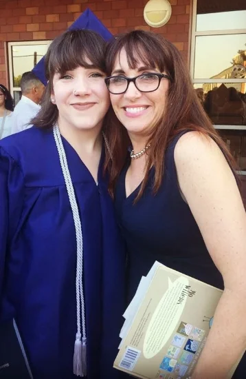 Daughter's high school graduation, May 2017 - Note the Mo Willems children's book, which is what happens when your 4th child graduates and the little special needs brother has to sit through the ceremony. :D 