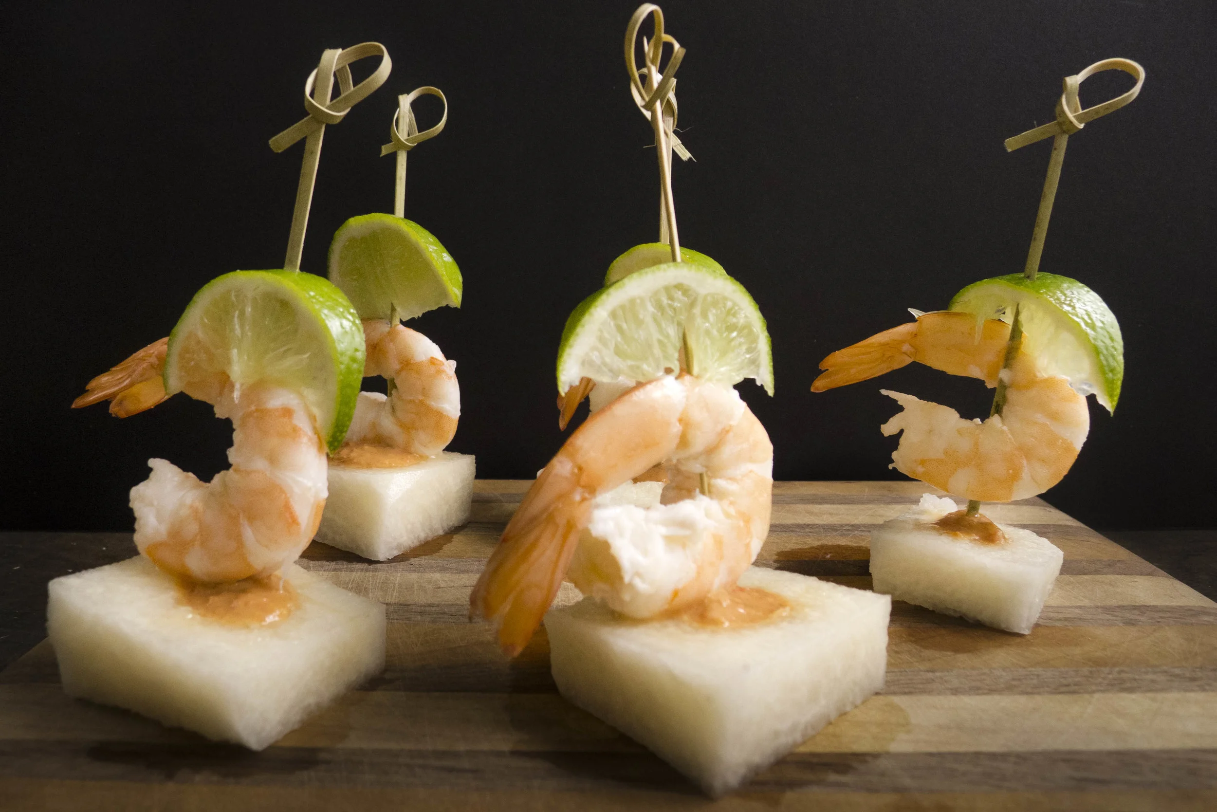 Shrimp and jicama appetizers with light coconut water peanut sauce