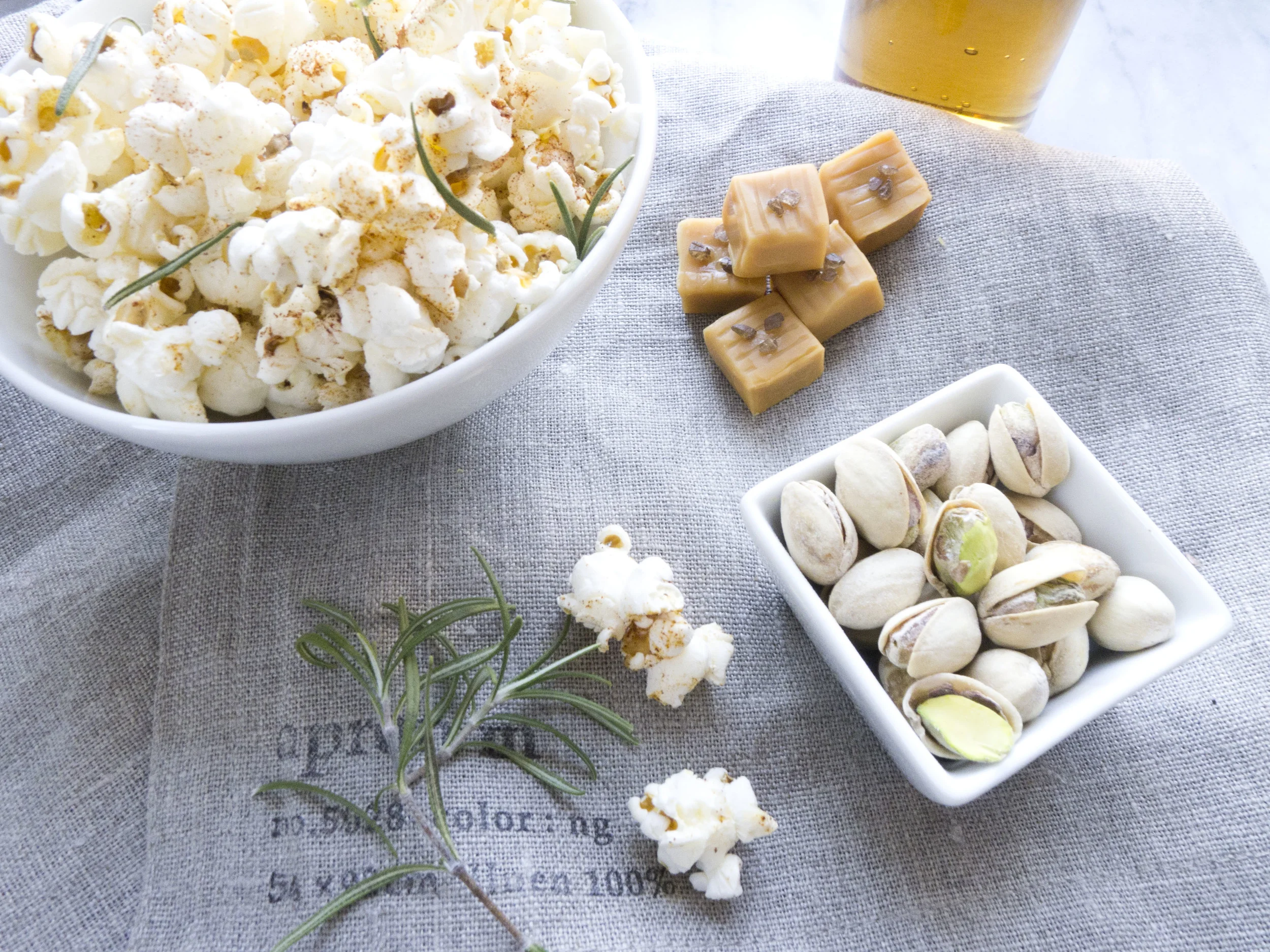 smoked salt caramels, popcorn with chipotle and rosemary, in shell pistachio, cream soda 