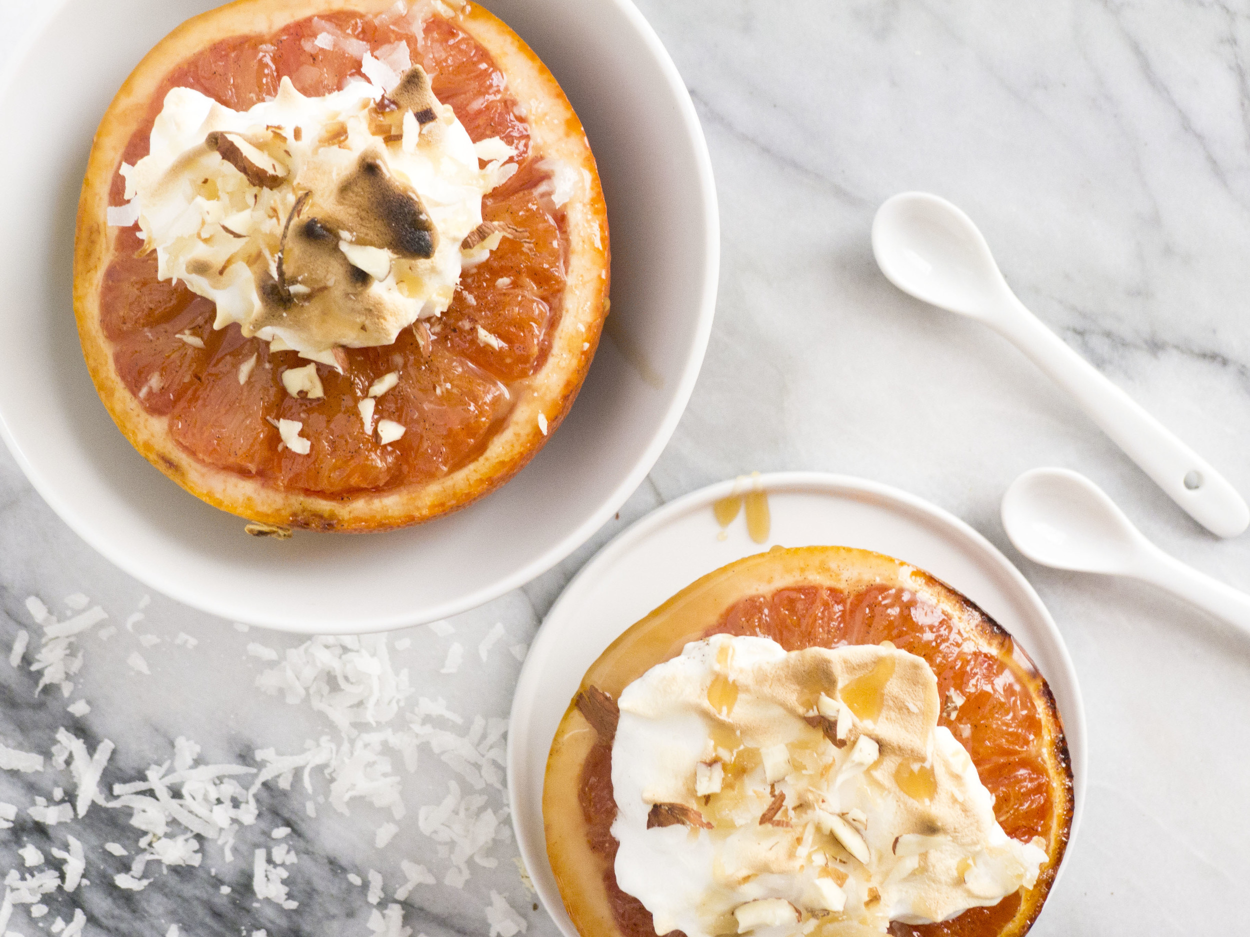broiled grapefruit meringue with caramel and hazelnuts 
