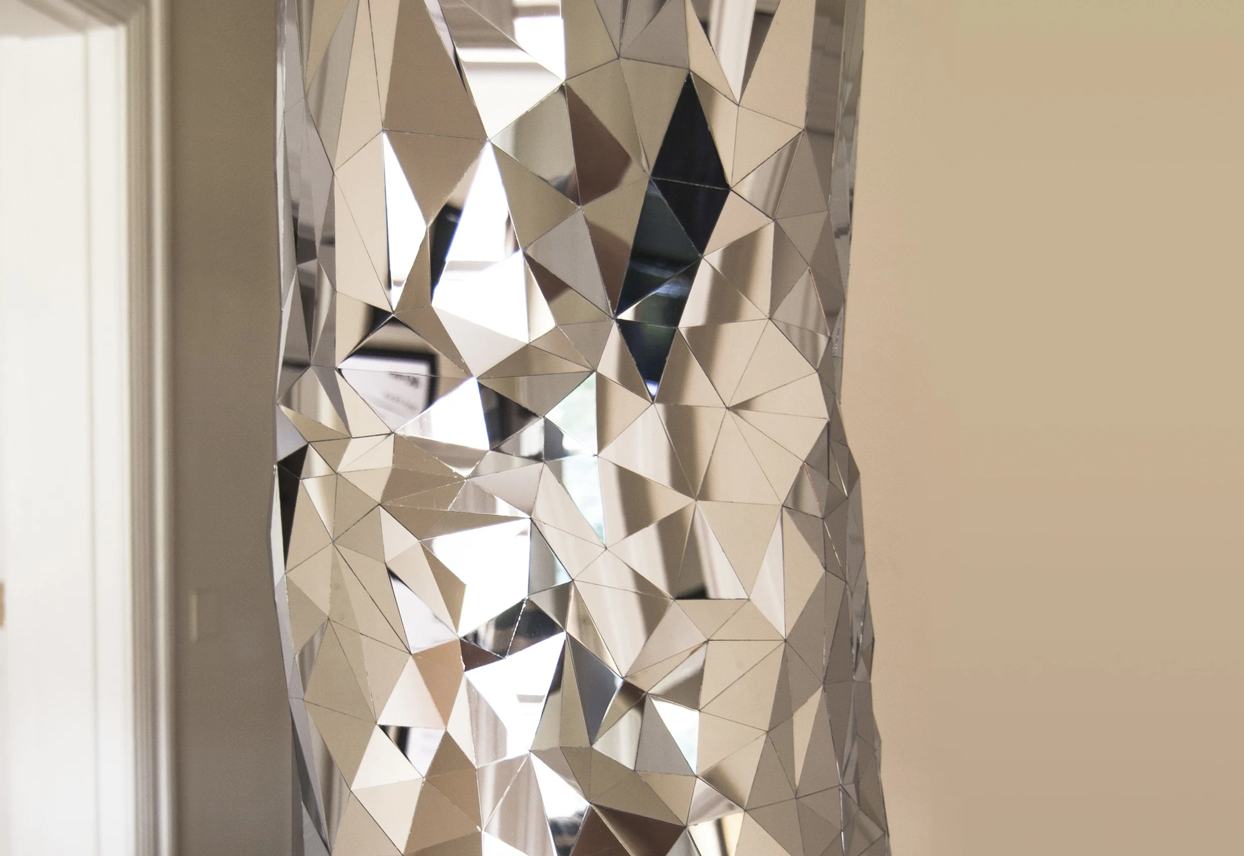 Heavy Bag(detail), 2015, Mirror polished stainless steel, 40" tall (chain length variable) x 15" diameter