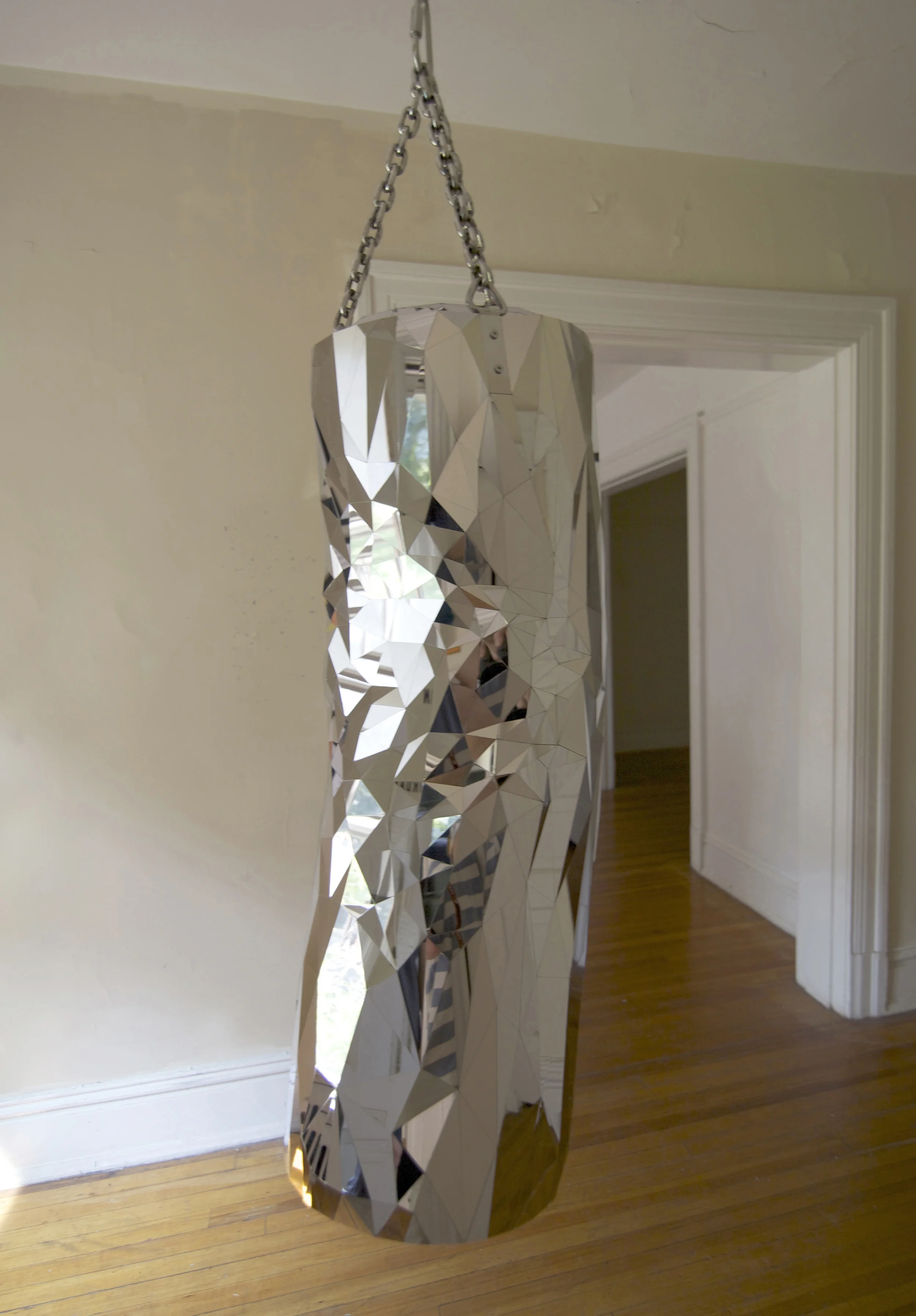 Heavy Bag, 2015, Mirror polished stainless steel, 40" tall (chain length variable) x 15" diameter
