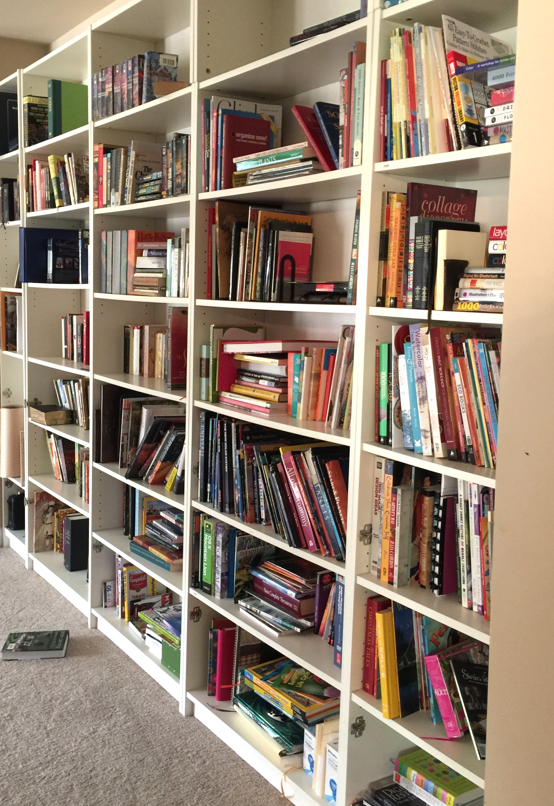 My books on the right. Fiction in the middle. Reference books below.