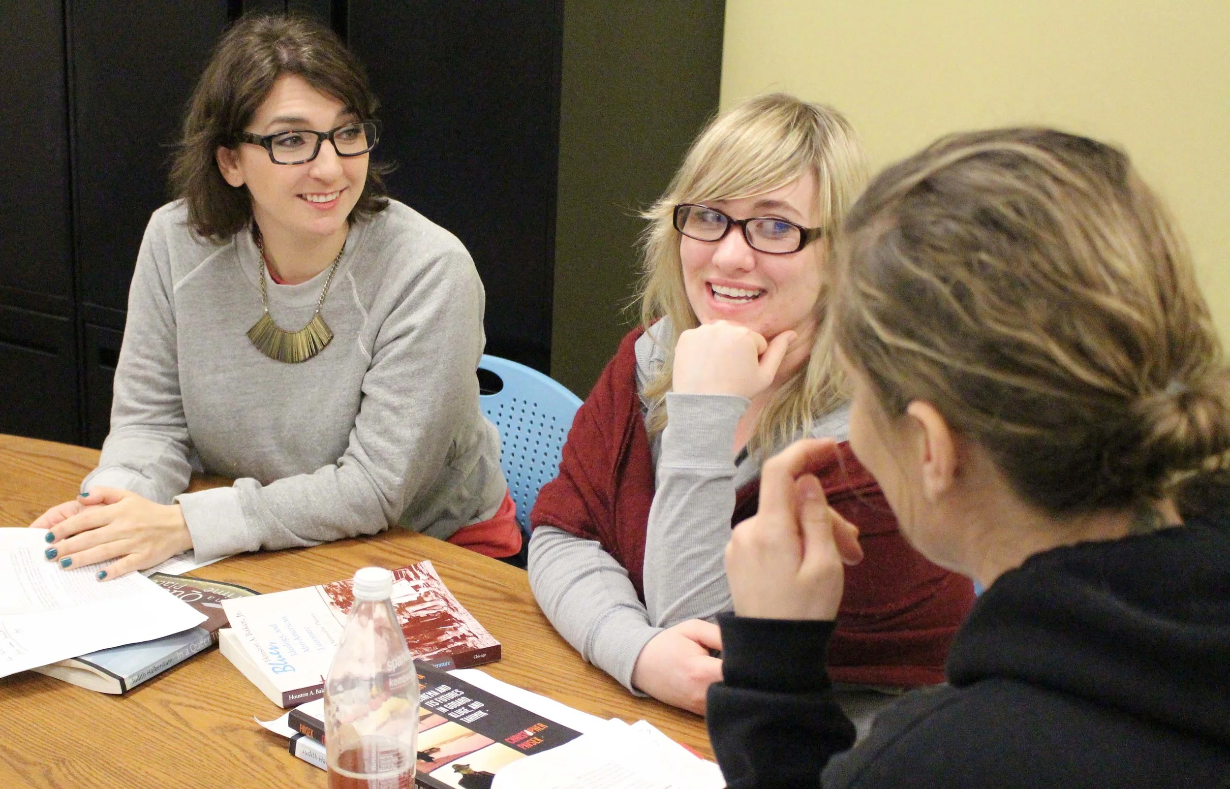 M.A. students Megan Pease, Stephanie MacDonell and Sophia Alioto discuss film theory after class