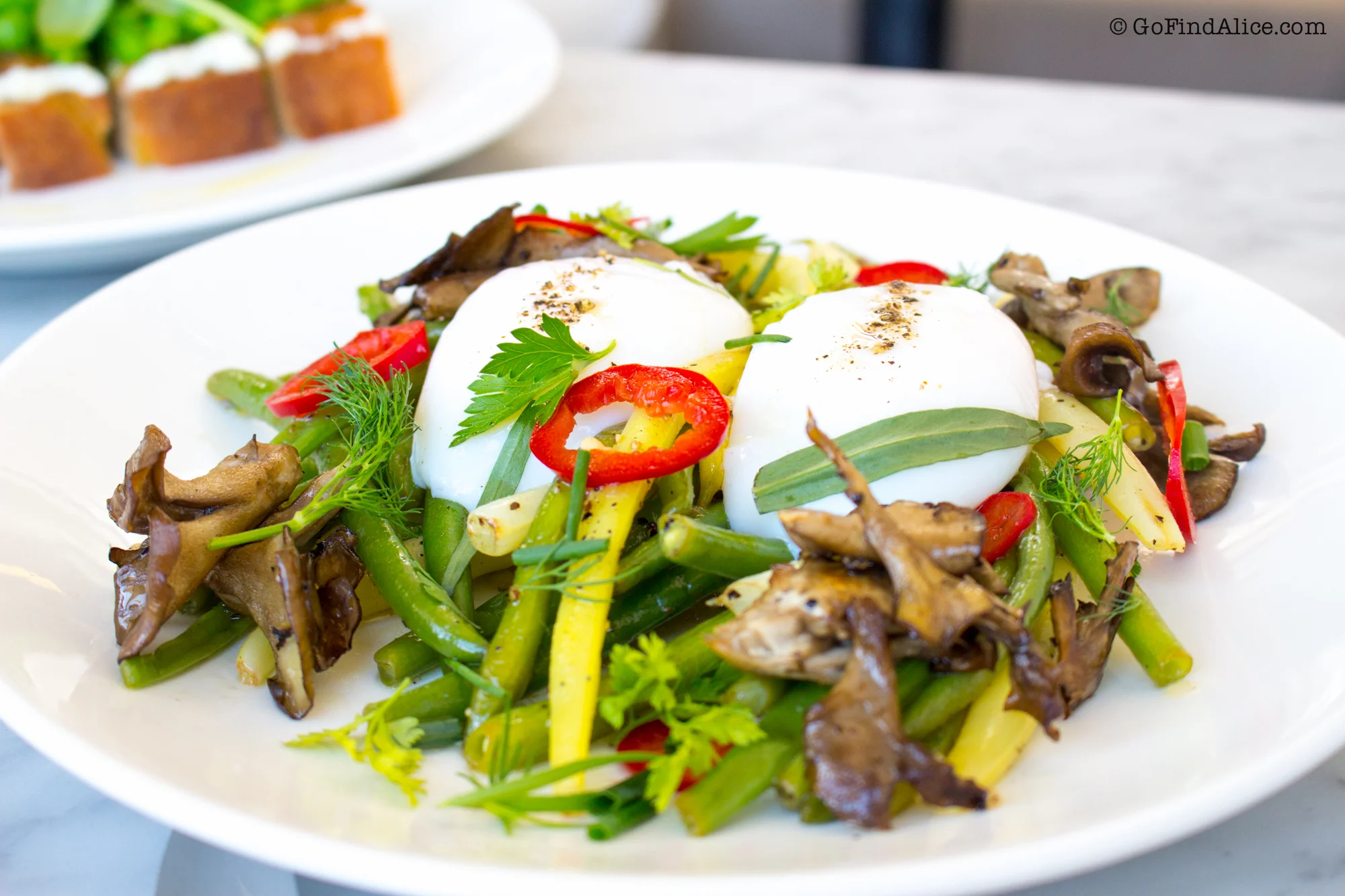 Poached eggs, asparagus, mushrooms, herb vinaigrette