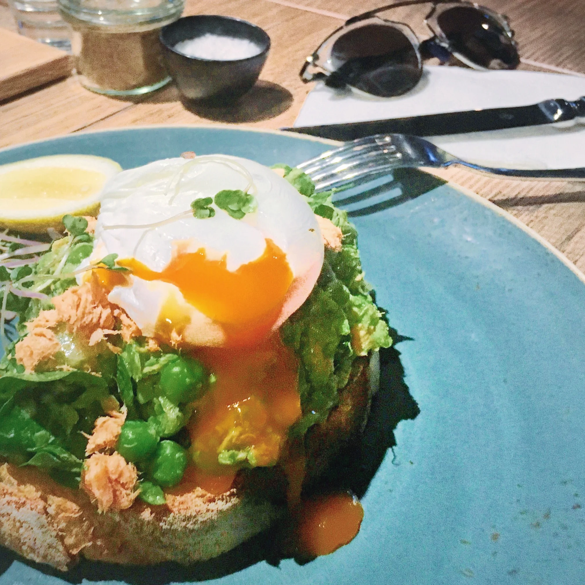 Smashed peas and trout toast topped with a poached egg. 