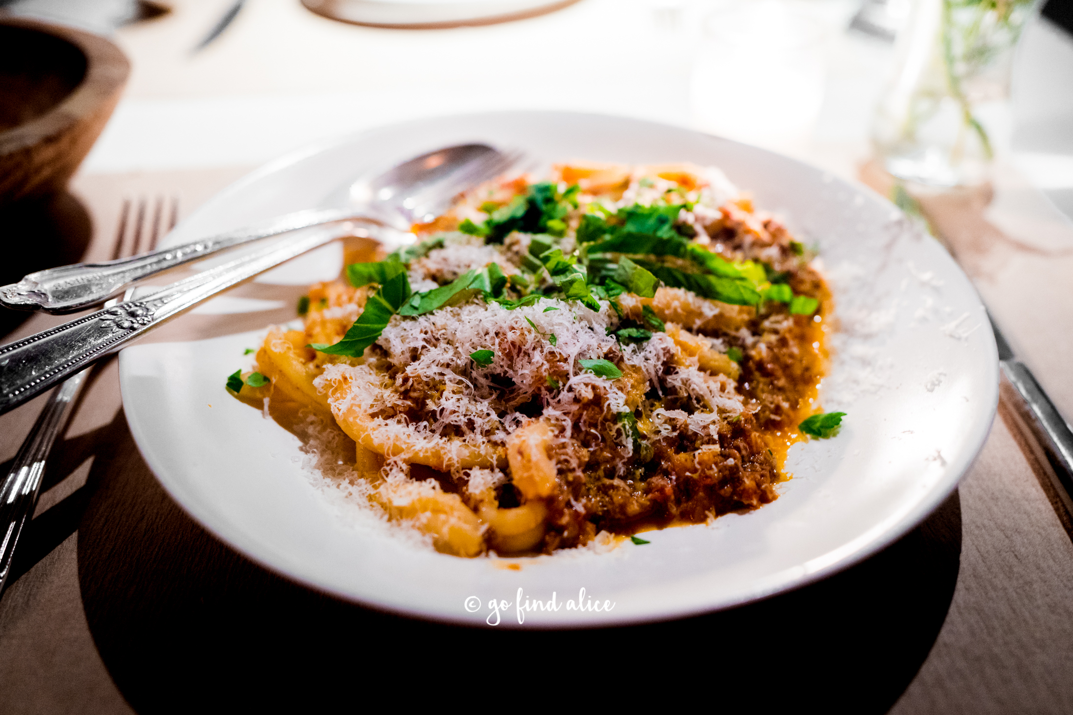 Strozzapreti with spicy bolognese and herbs ($29)
