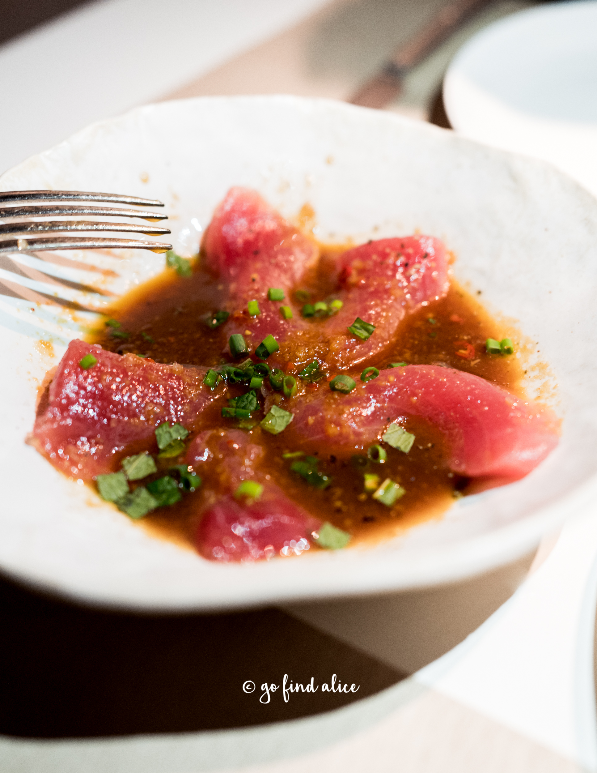 Line Caught Tuna Sashimi Marinated with Ginger and Mint ($19)