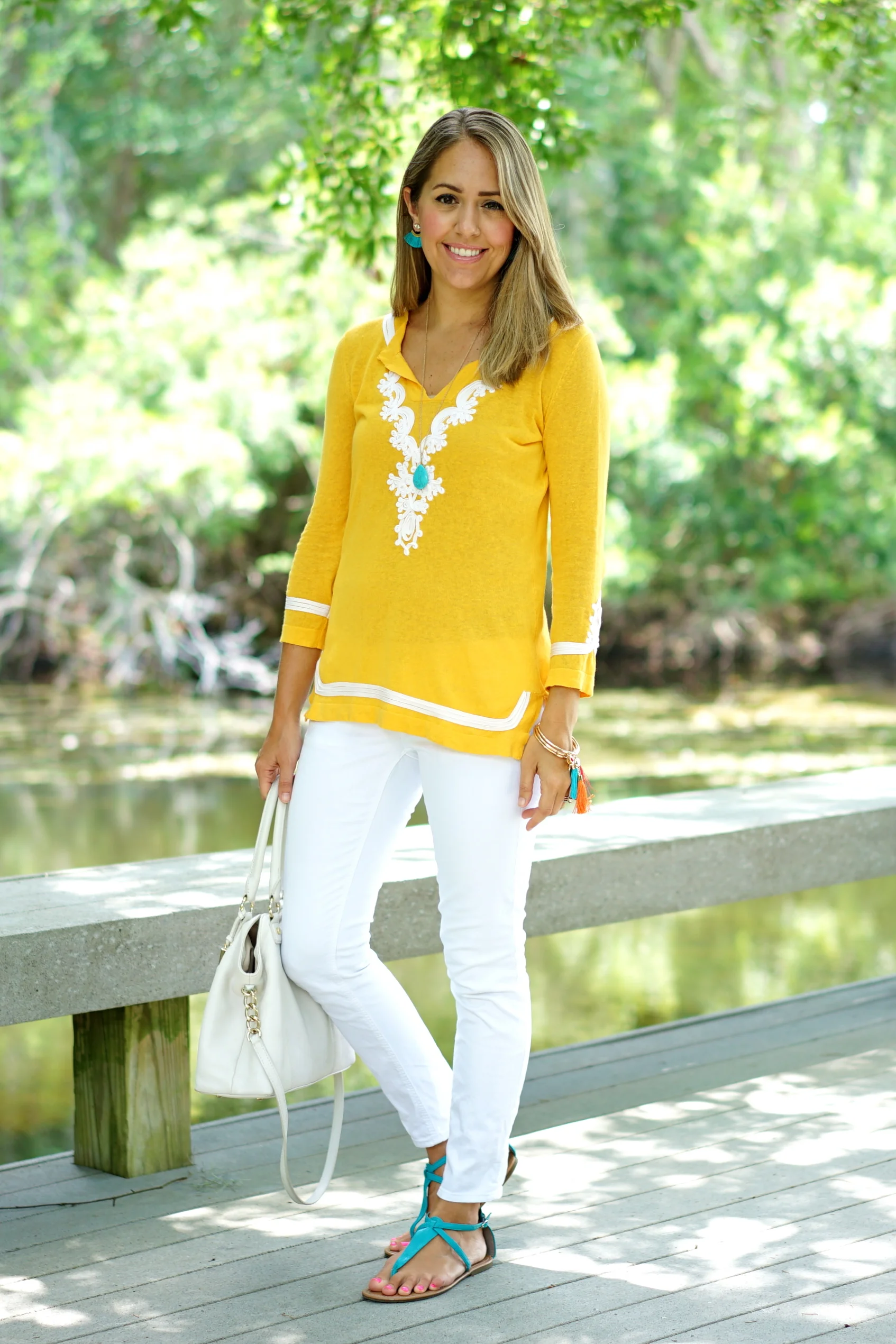 Yellow sweater, white jeans, turquoise sandals